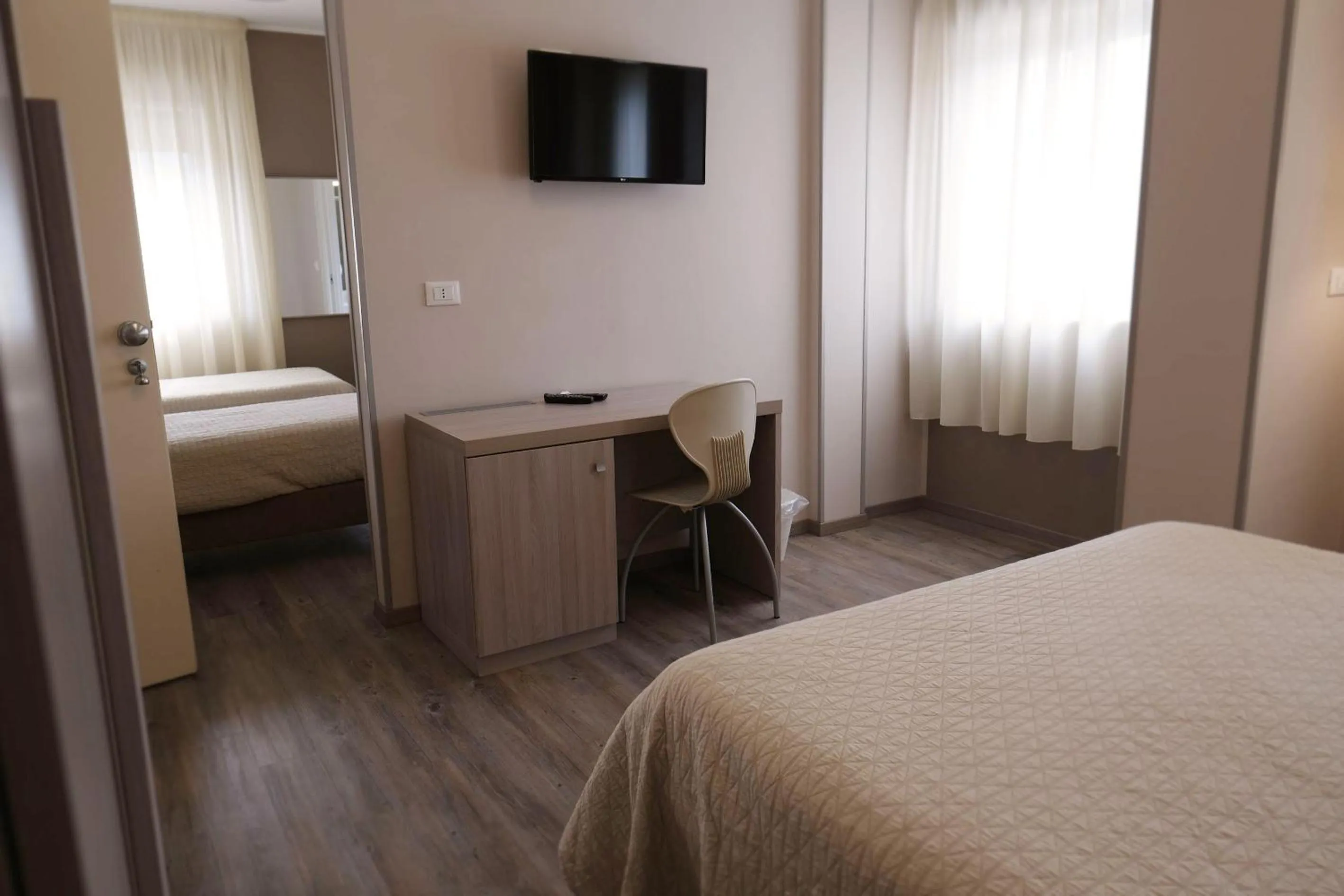 Photo of the whole room, Bed in Magic Hotel