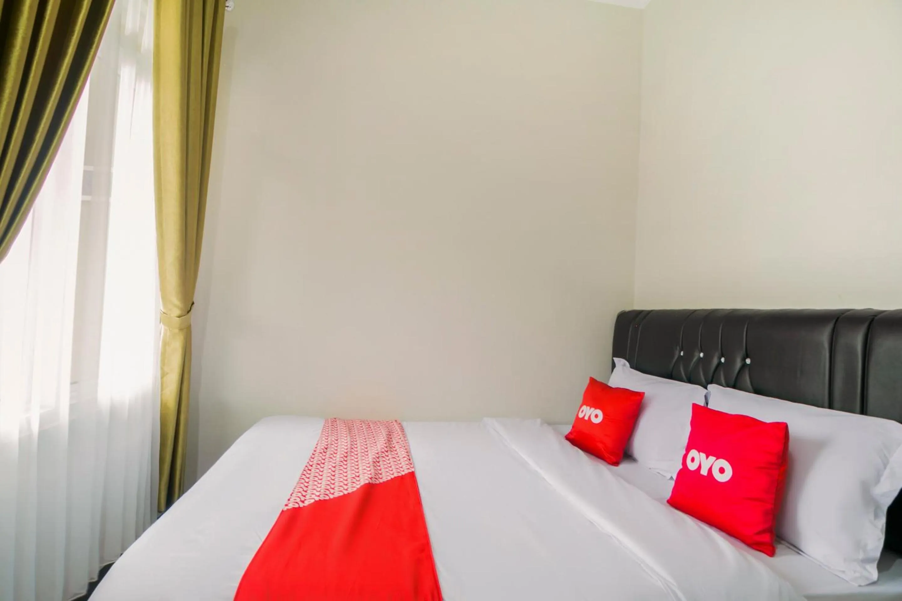 Bedroom in Hotel O Fakhira Residence