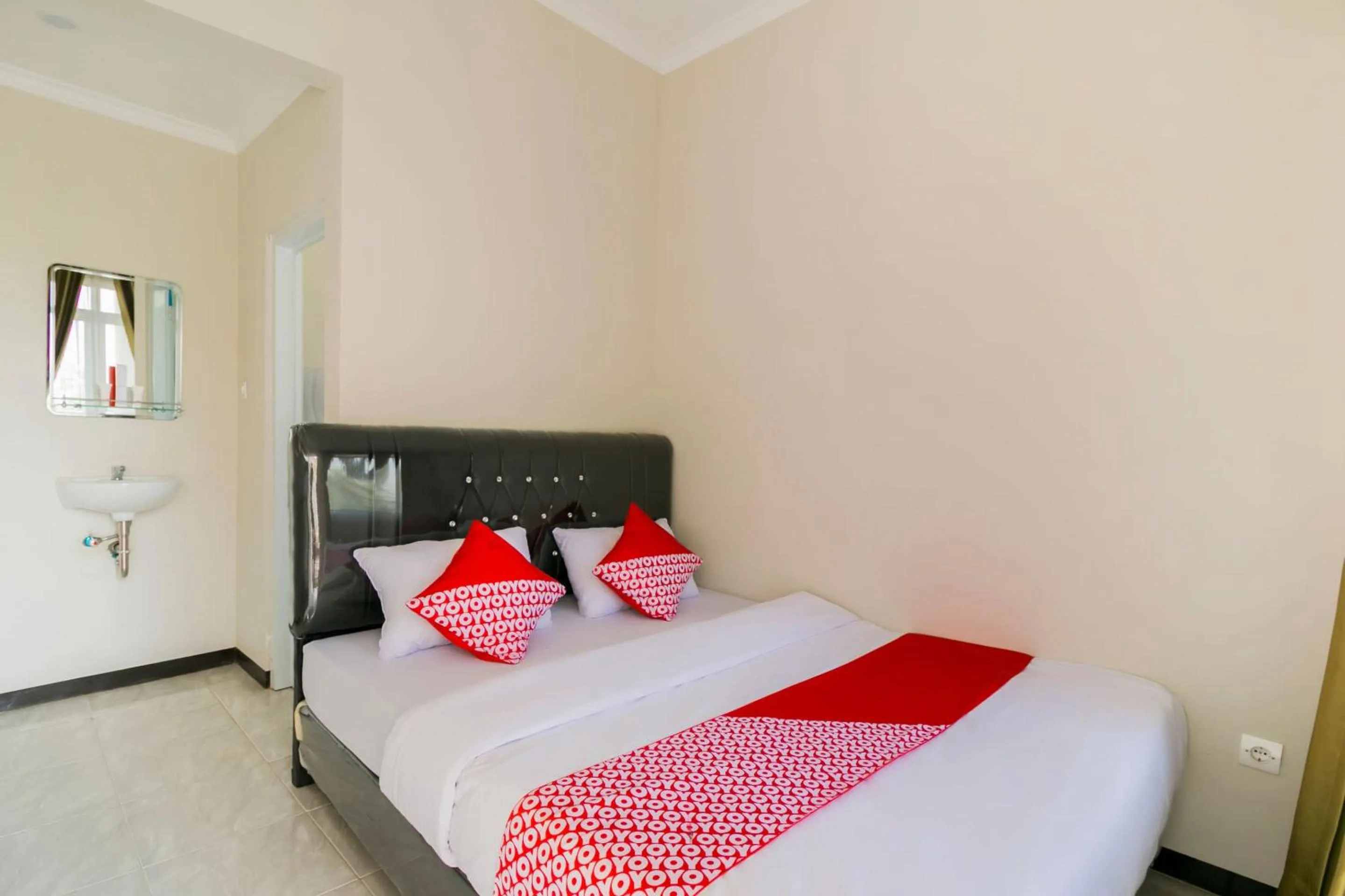 Bedroom in Hotel O Fakhira Residence