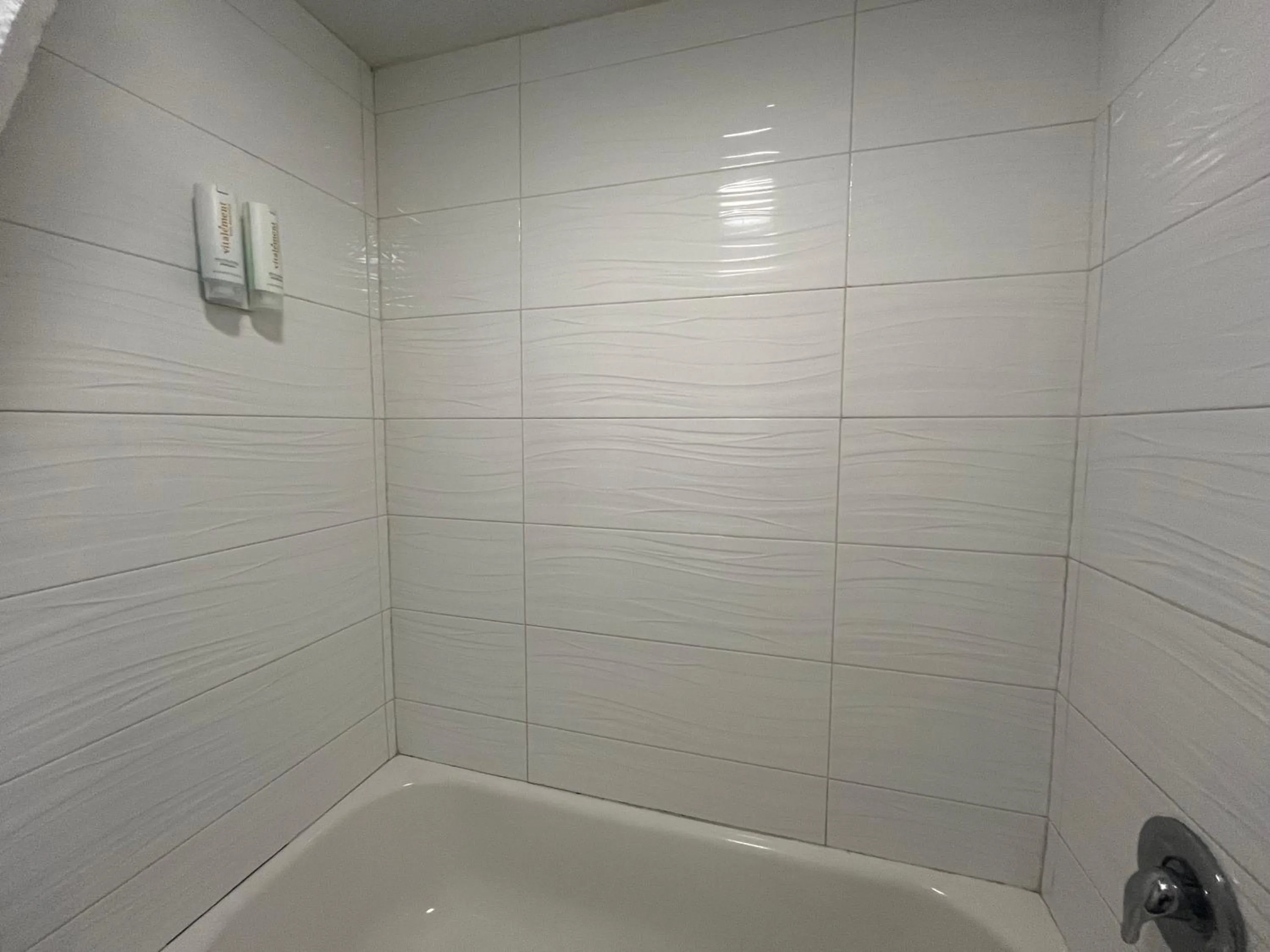 Shower in Clarion Inn & Suites Kissimmee-Lake Buena Vista South