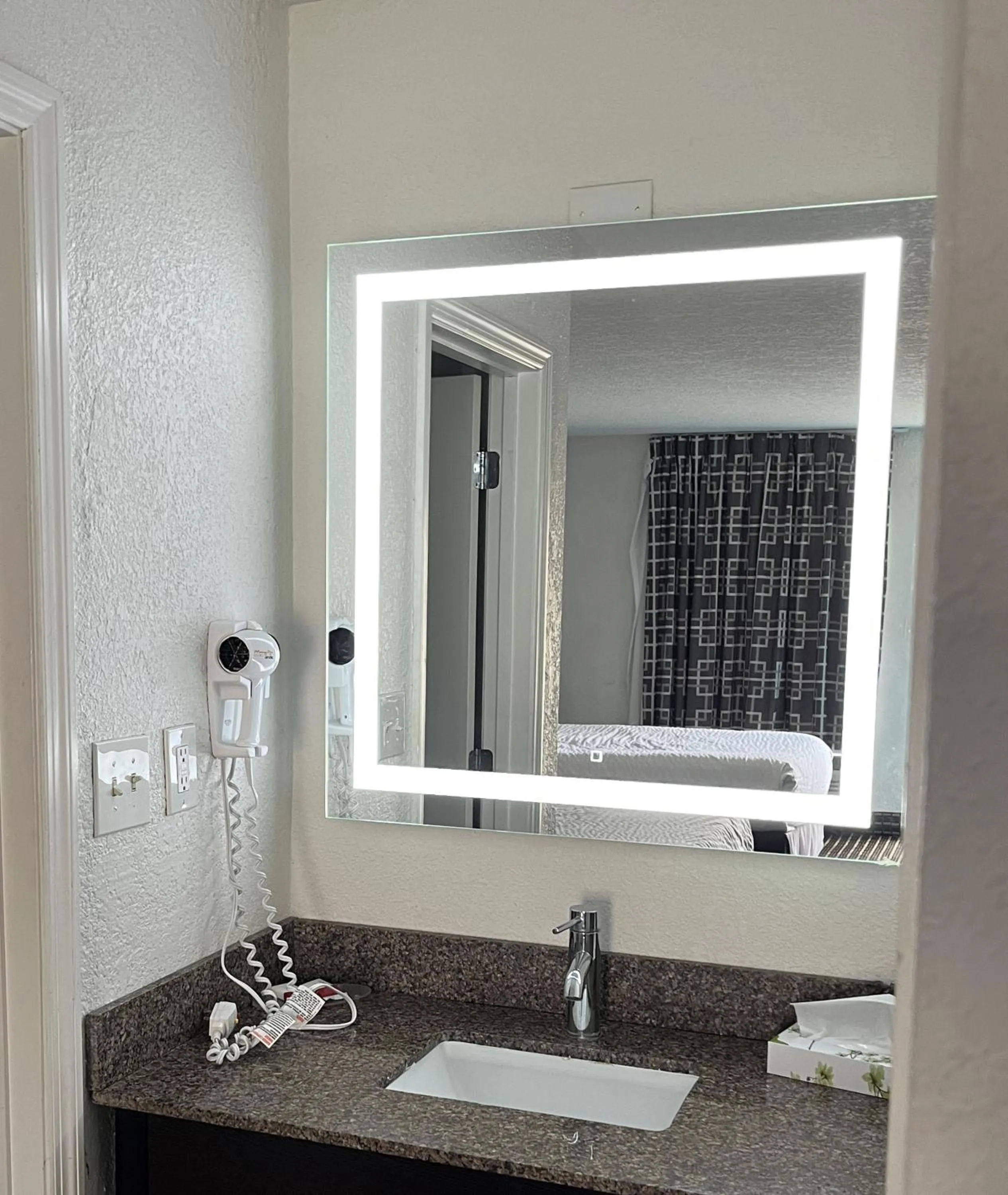 Bathroom in Clarion Inn & Suites Kissimmee-Lake Buena Vista South