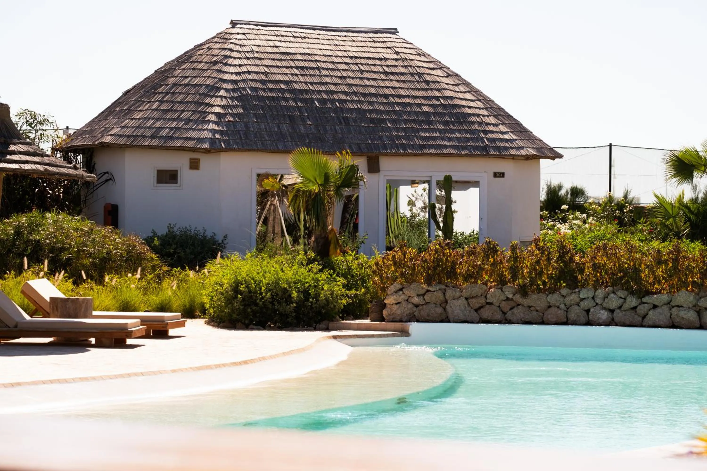 Swimming pool in La Crique Nature & Spa