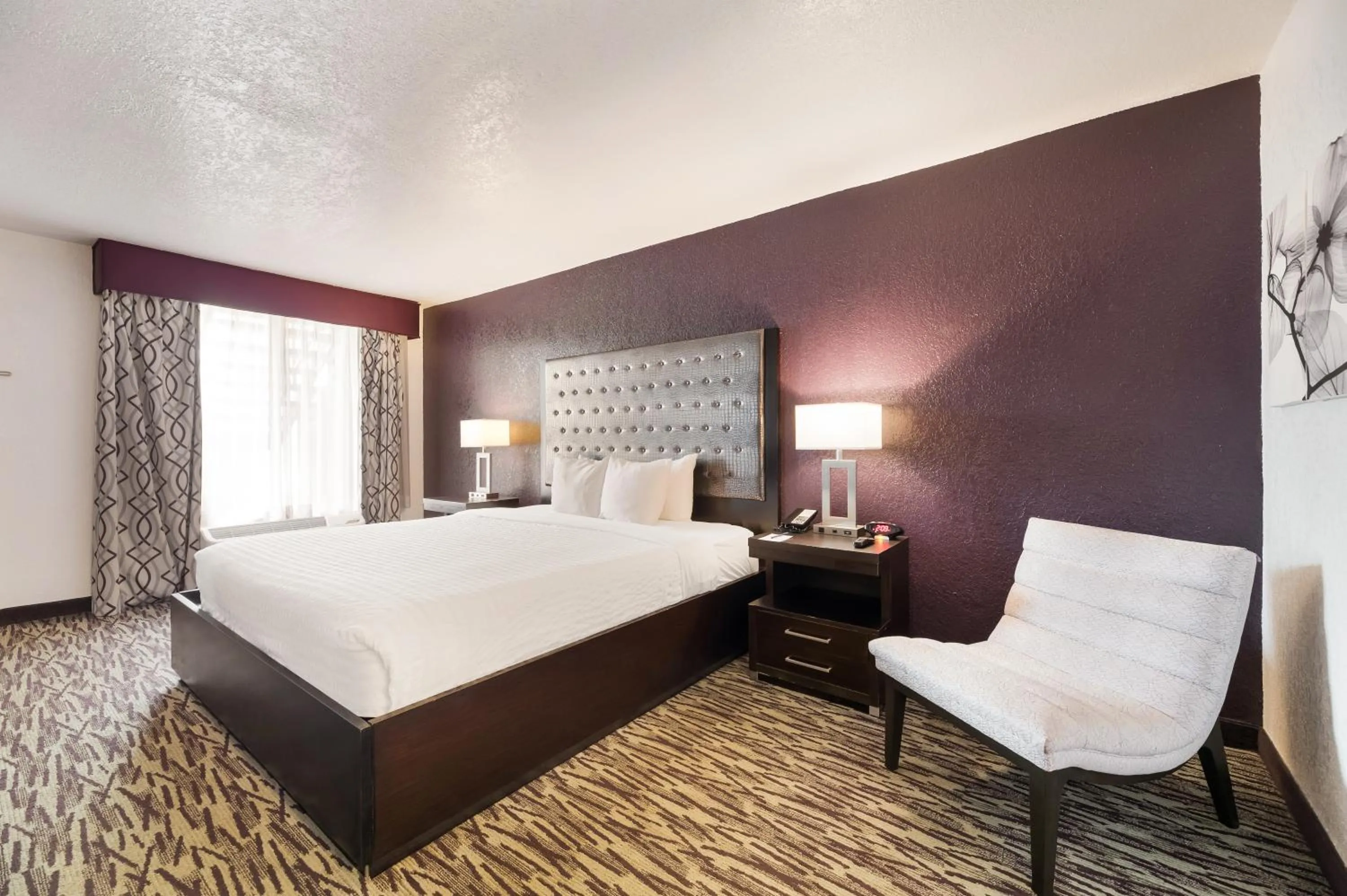 Bedroom, Bed in Clarion Inn & Suites Across From Universal Orlando Resort