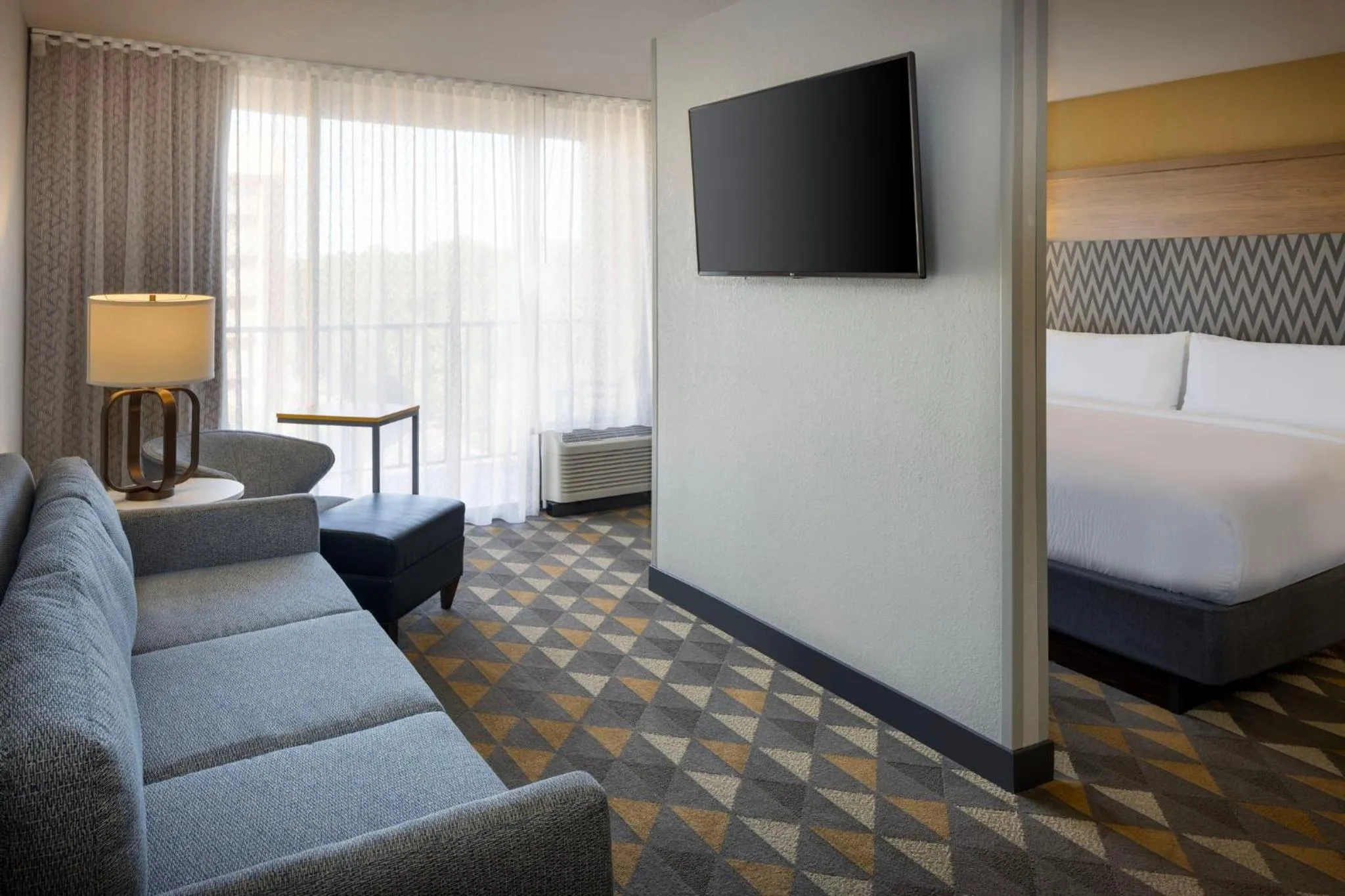 Photo of the whole room, Bed in Holiday Inn & Suites Orlando SW - Celebration Area by IHG