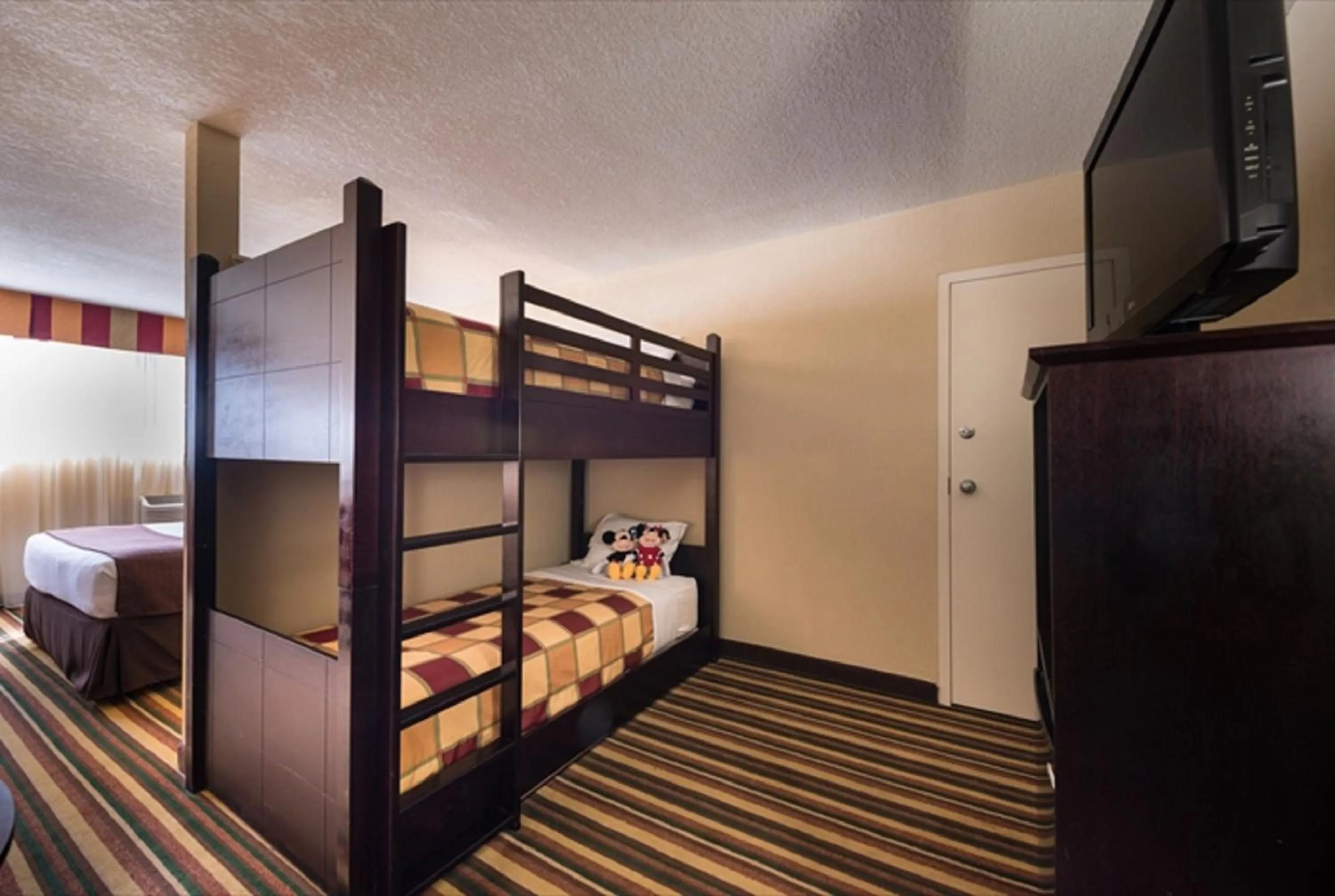 Photo of the whole room, Bed in Holiday Inn & Suites Orlando SW - Celebration Area by IHG