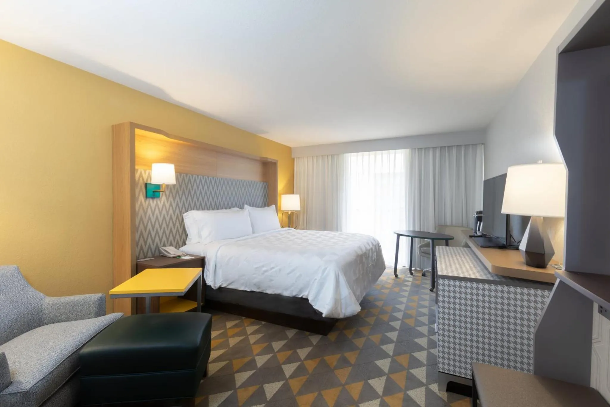 Photo of the whole room, Bed in Holiday Inn & Suites Orlando SW - Celebration Area by IHG