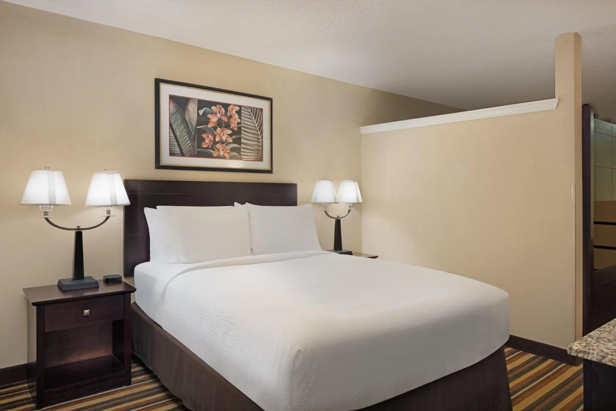 Photo of the whole room, Bed in Holiday Inn & Suites Orlando SW - Celebration Area by IHG
