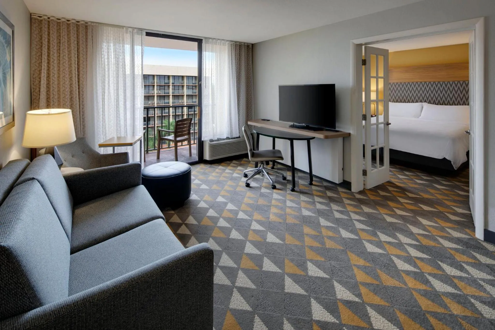 Photo of the whole room, Bed in Holiday Inn & Suites Orlando SW - Celebration Area by IHG