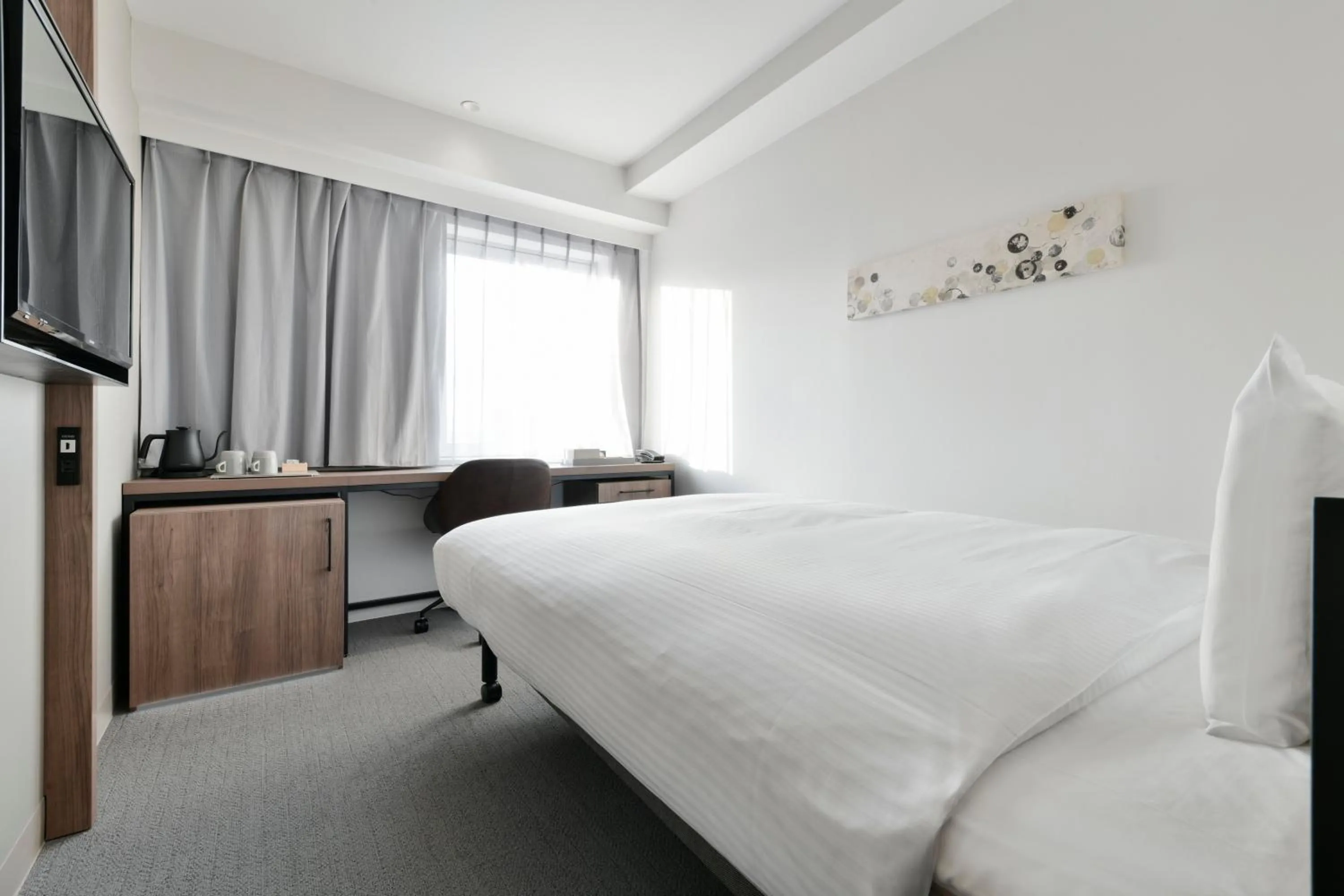 Bed in Vessel Inn Keisei Tsudanuma Ekimae