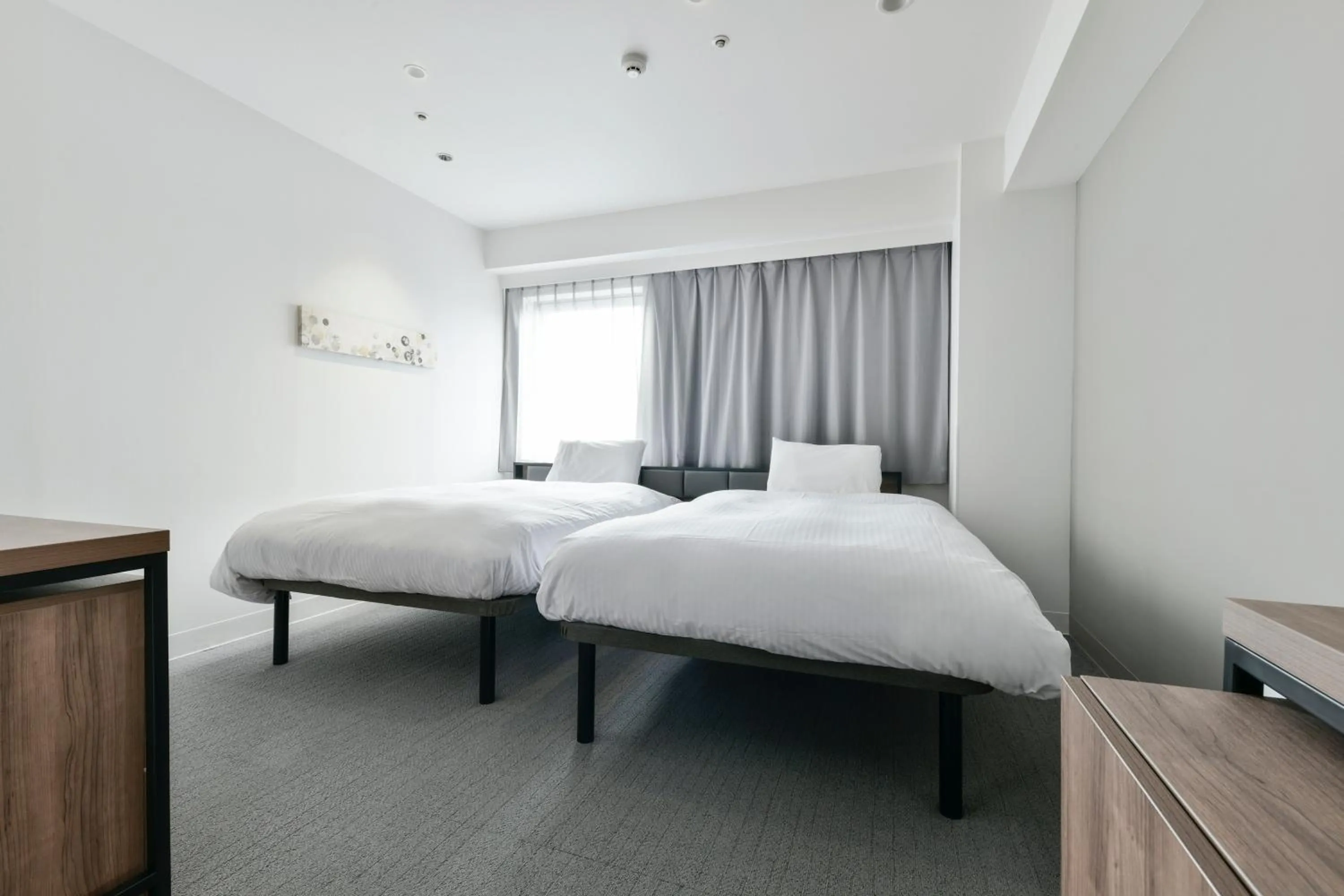 Bed in Vessel Inn Keisei Tsudanuma Ekimae