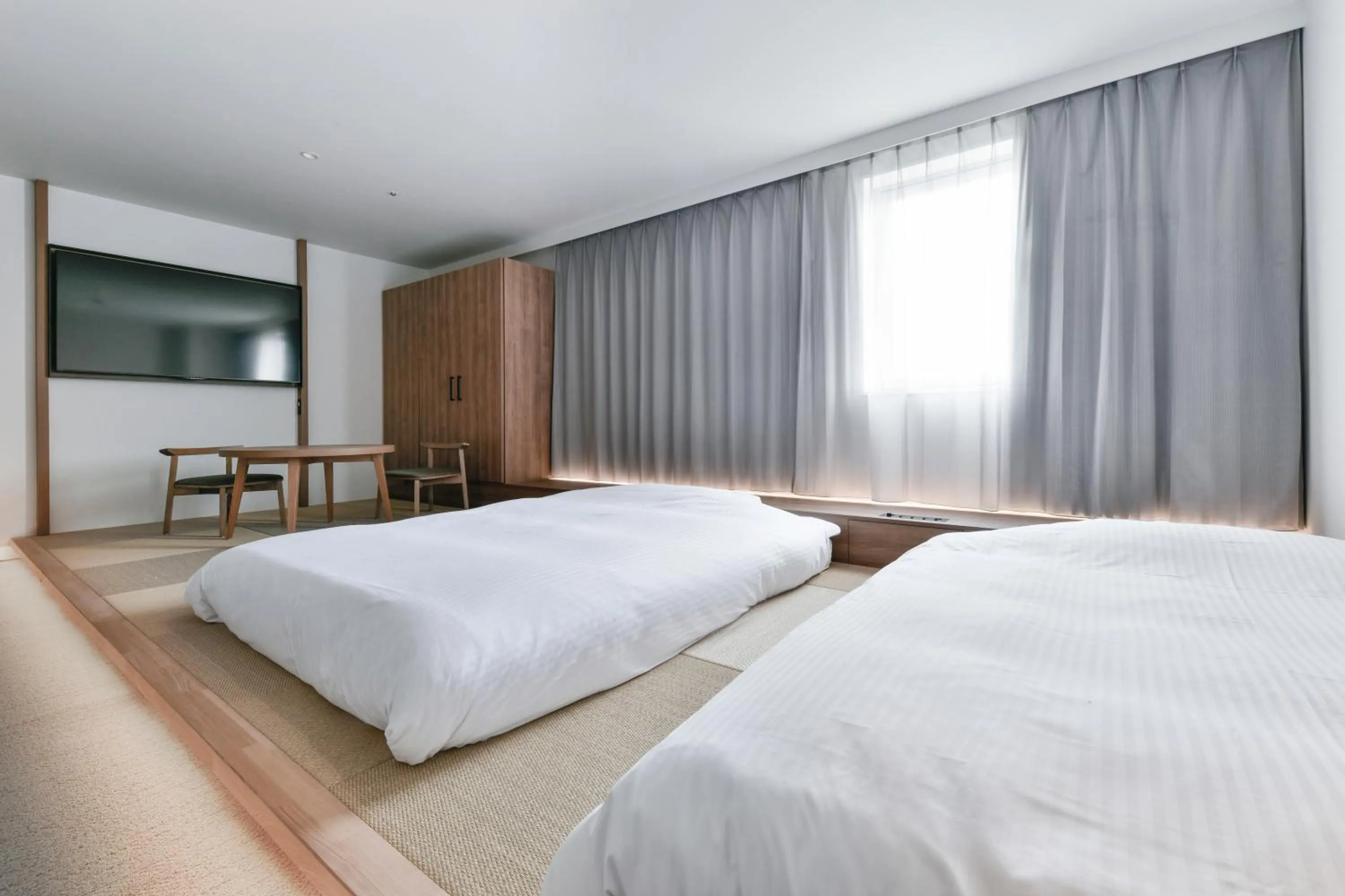 Bed in Vessel Inn Keisei Tsudanuma Ekimae