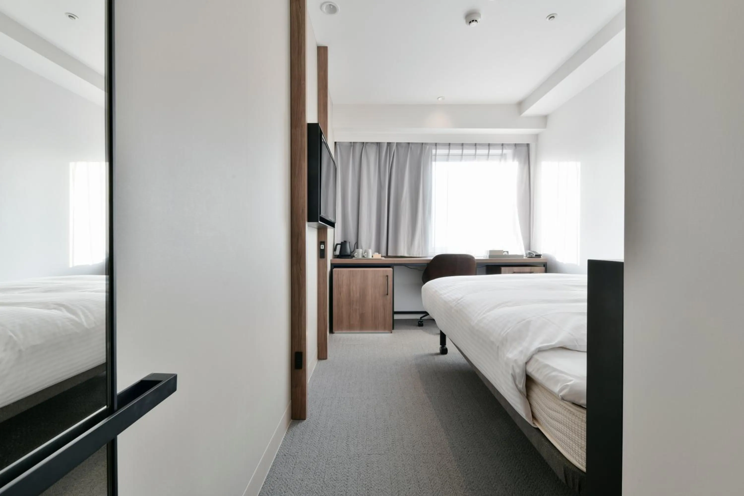 Bed in Vessel Inn Keisei Tsudanuma Ekimae