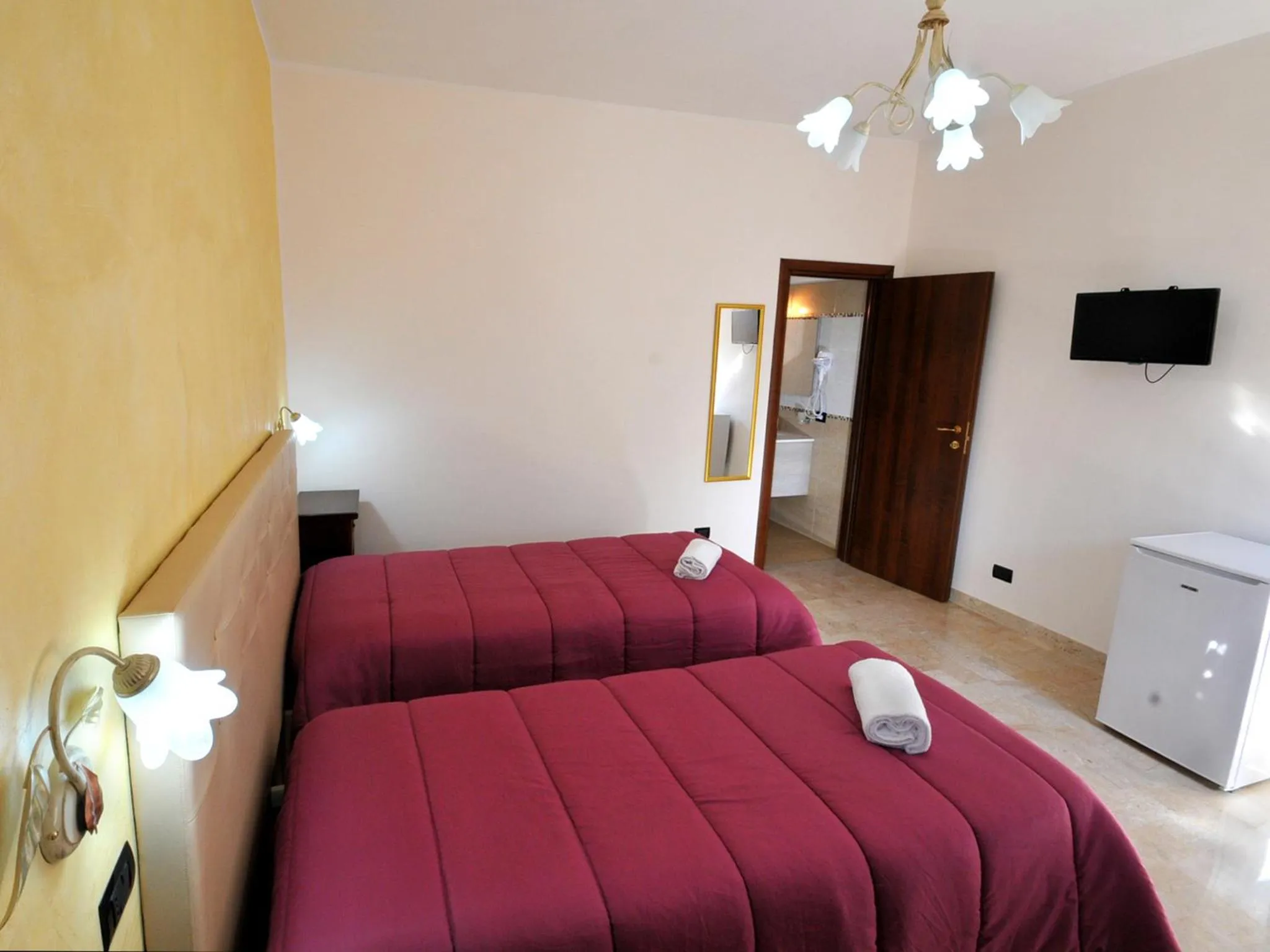 Bedroom in Il Calesse B&B