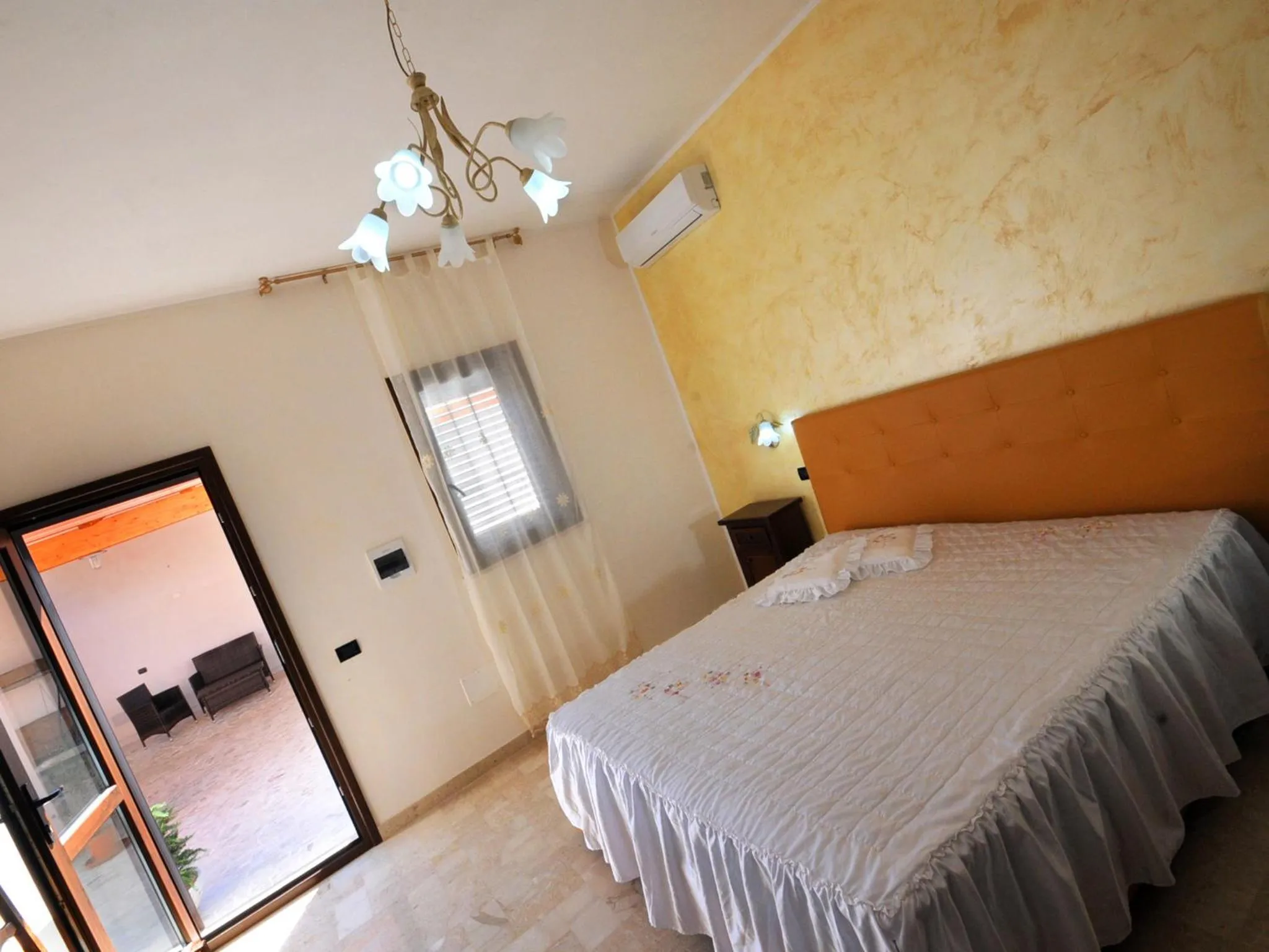 Bedroom in Il Calesse B&B