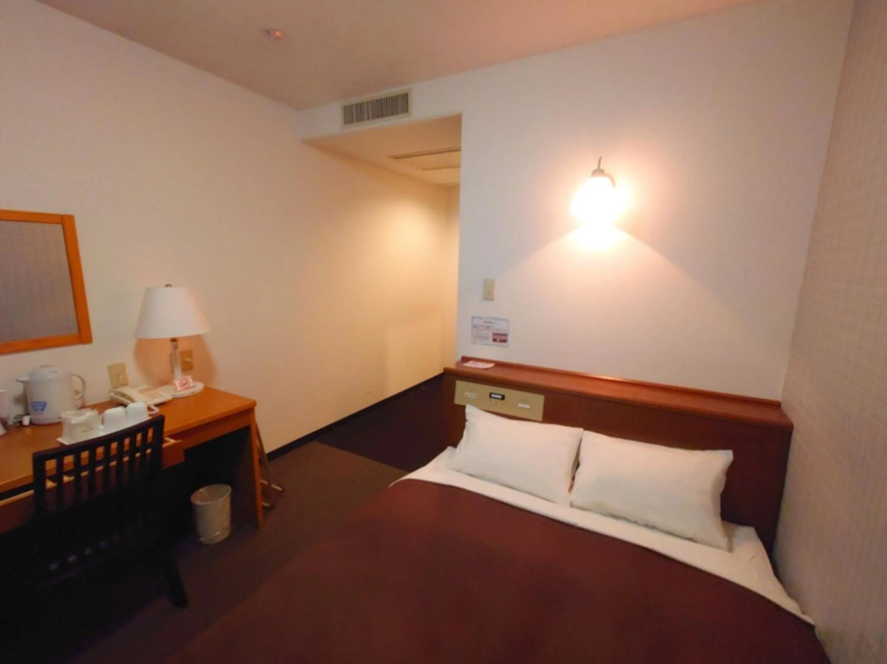 Bed in Garden Hotel Matsumoto