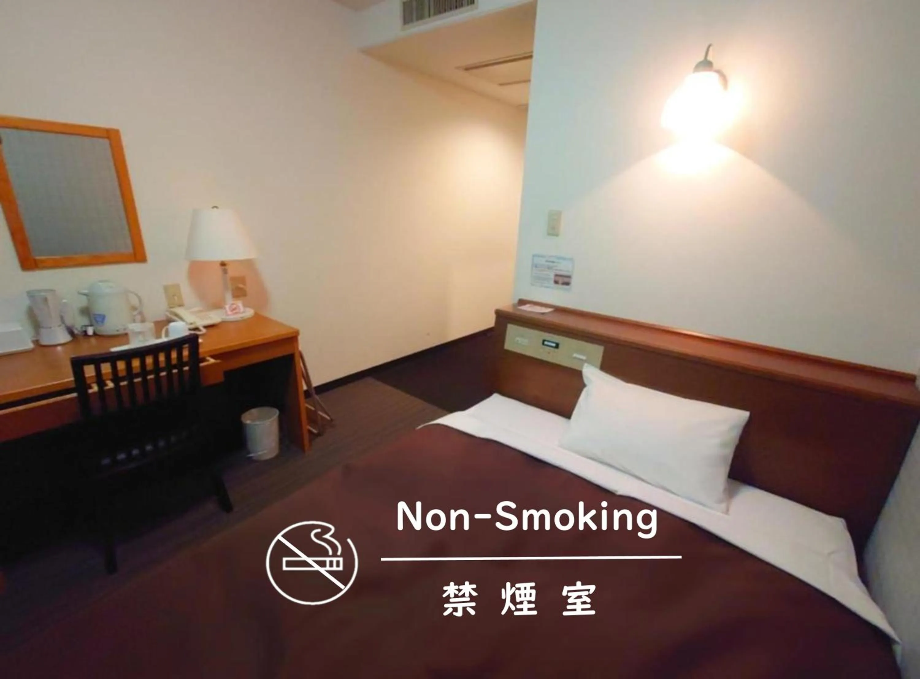 Photo of the whole room, Bed in Garden Hotel Matsumoto