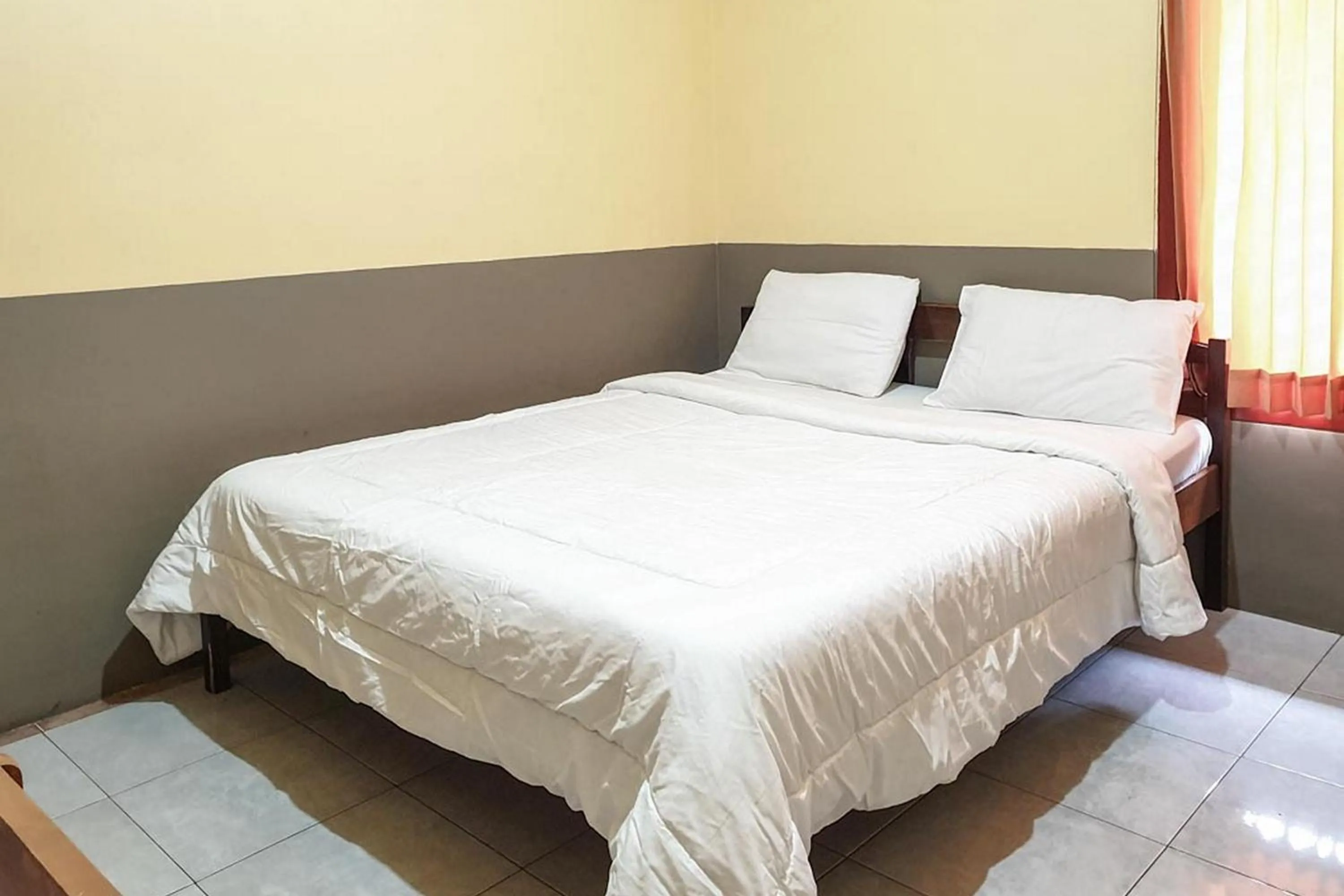 Bed in Tengger Indah Bromo Homestay at Desa Wisata Bromo Mitra RedDoorz