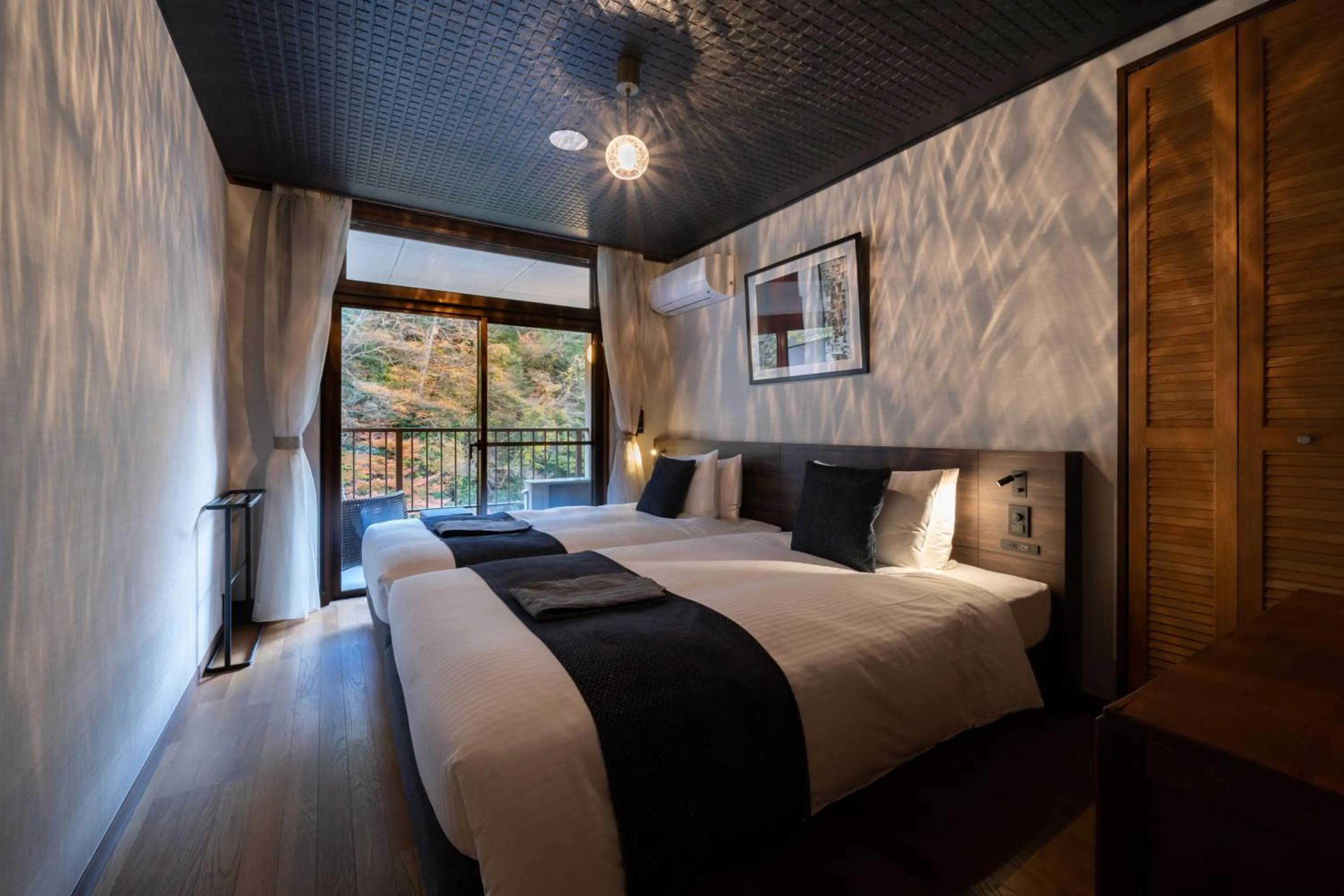 Bed in Onsen Guest House Tsutaya