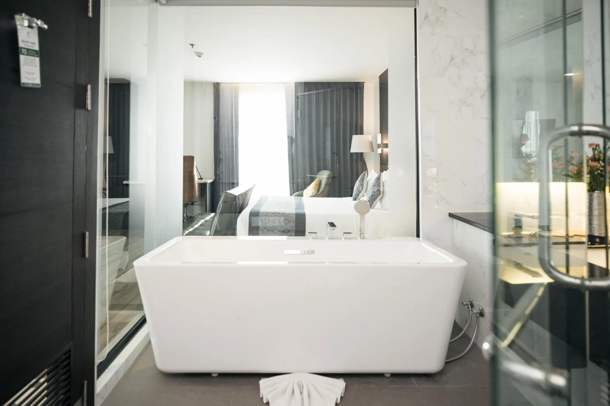 Bathroom, Bed in SureStay Hotel by Best Western Vientiane