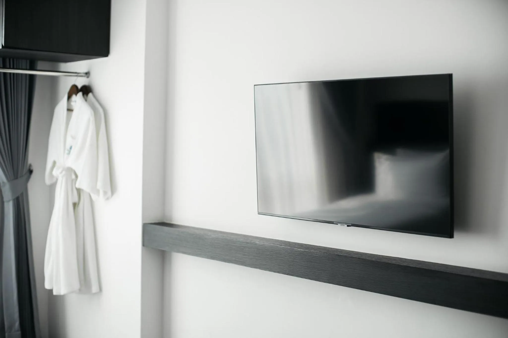 TV and multimedia in SureStay Hotel by Best Western Vientiane