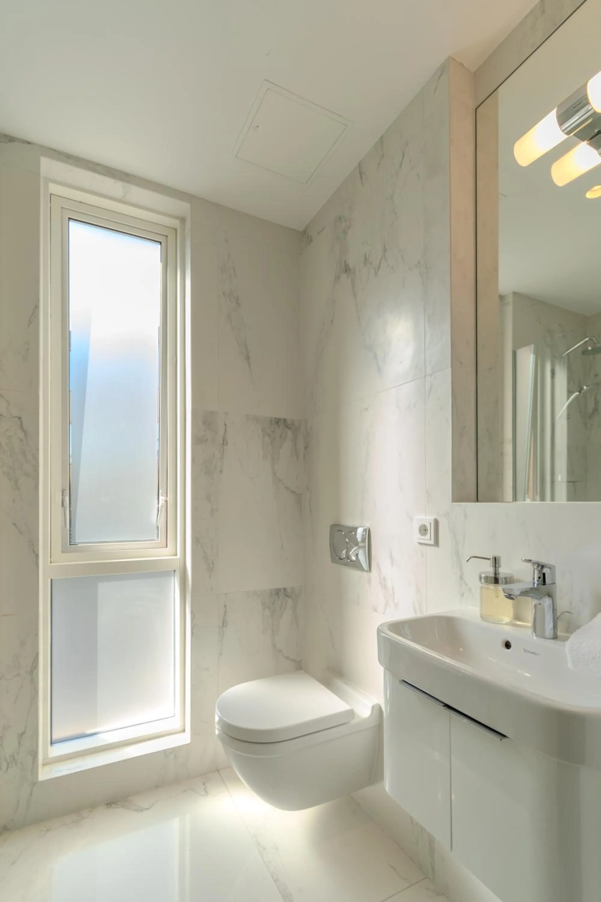 Toilet in Midtown Hotel