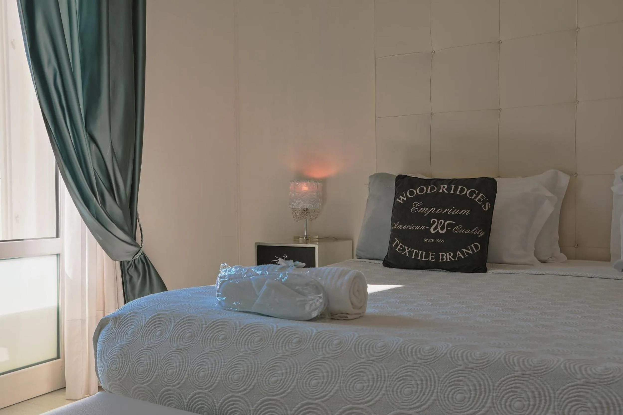 Bed in Palco Rooms&Suites