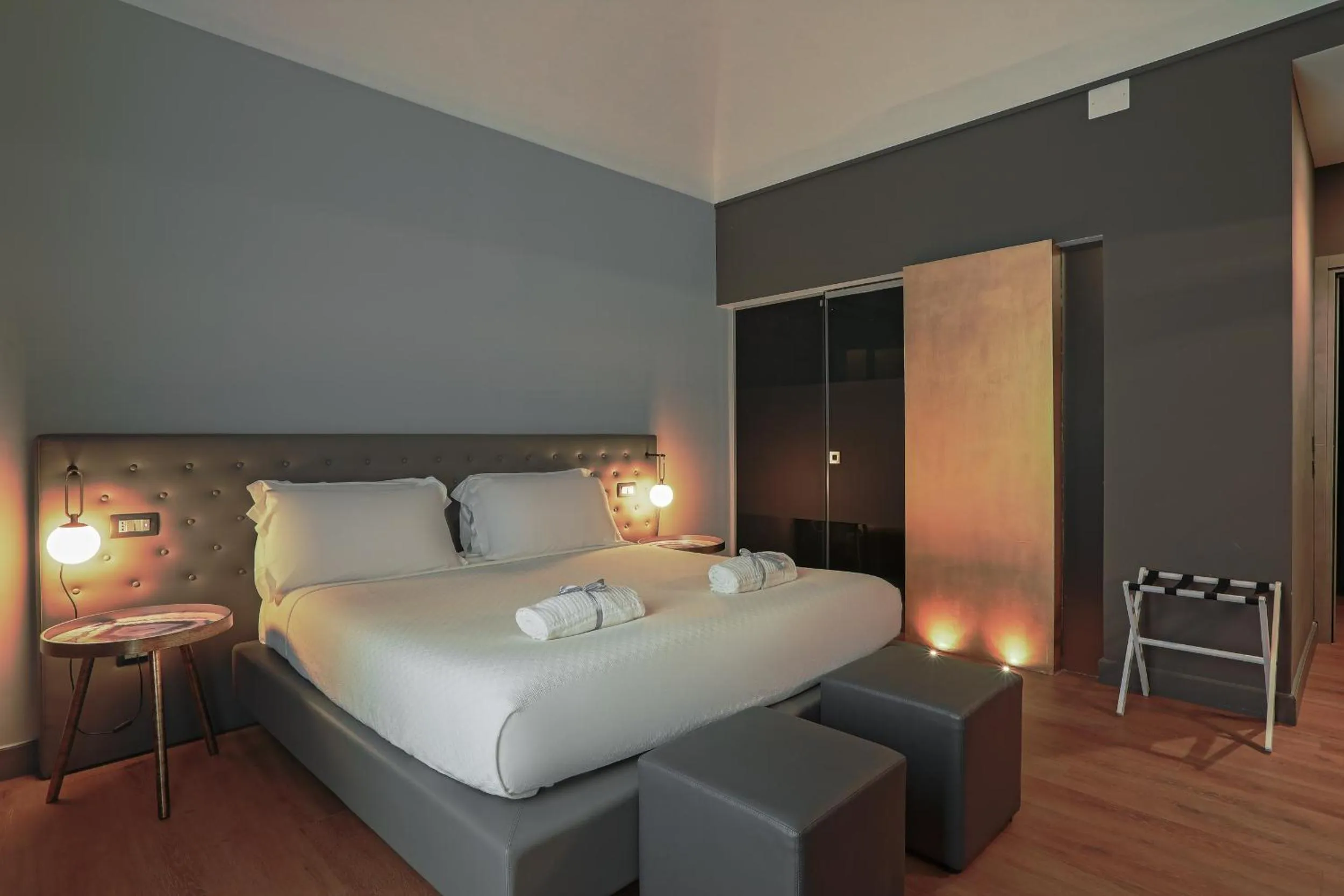 Bed in Palco Rooms&Suites