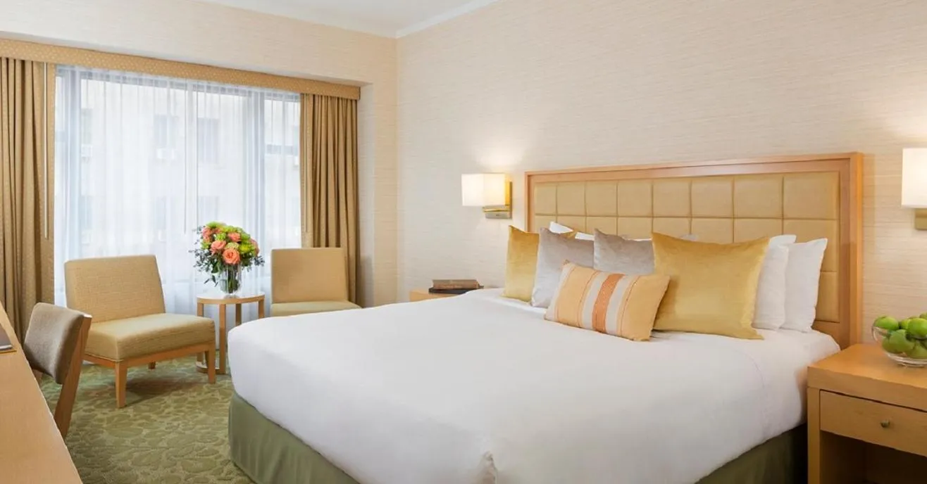 Bed in Orchard Garden Hotel