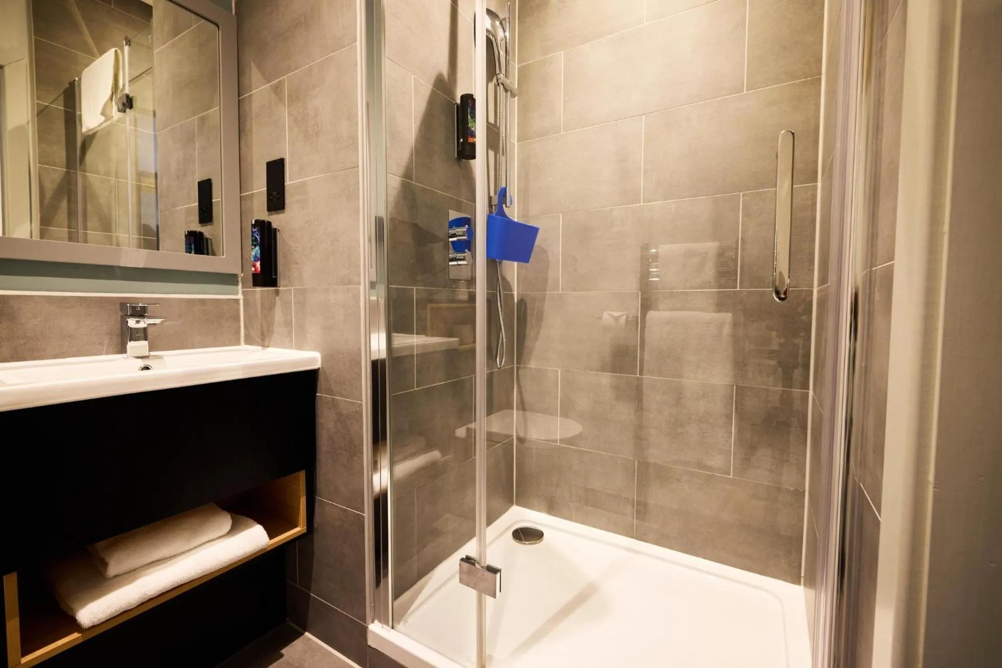 Bathroom in Holiday Inn - the niu, Loom Manchester North by IHG