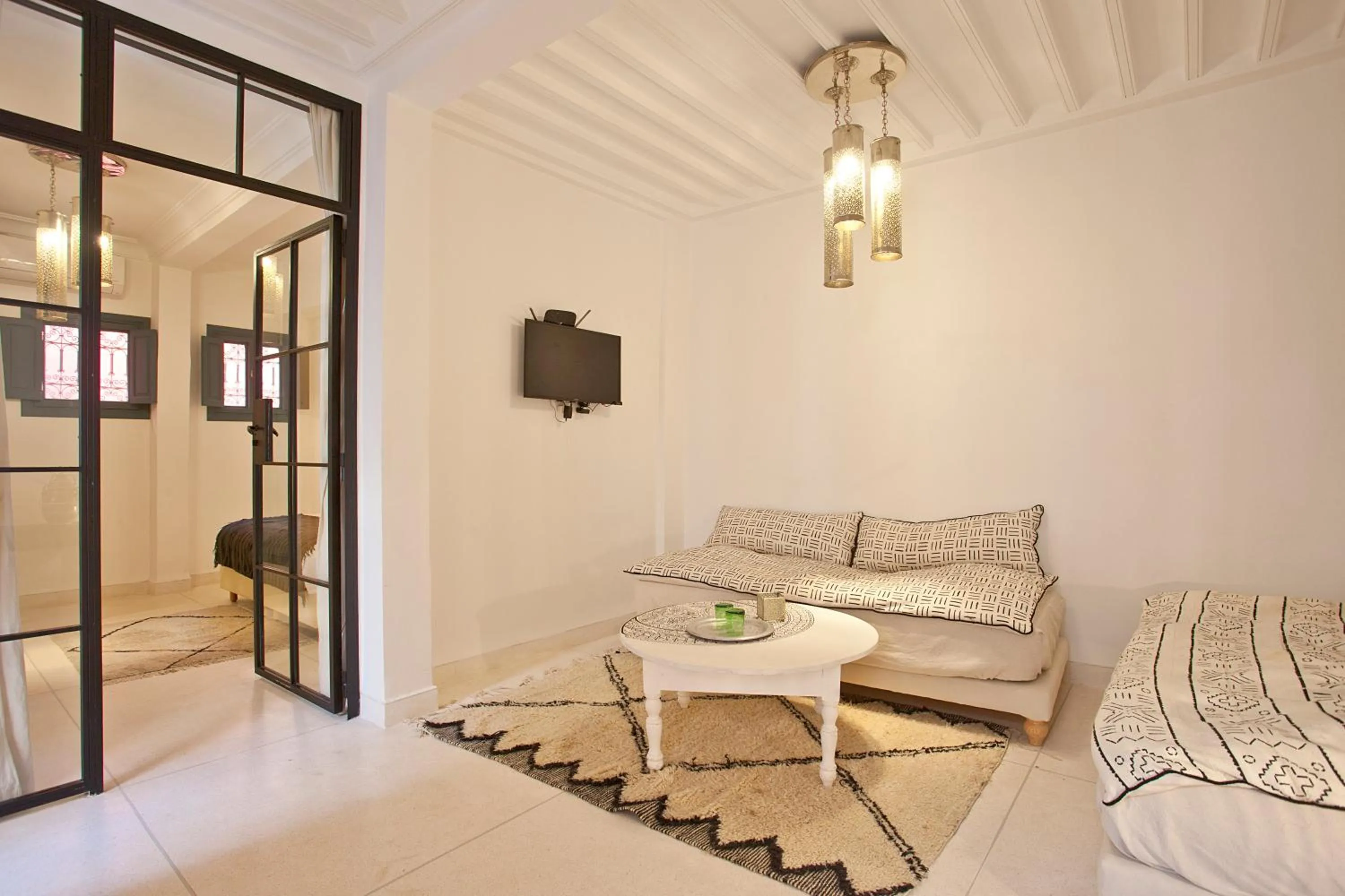 Living room, Bed in Riad AL RIAD