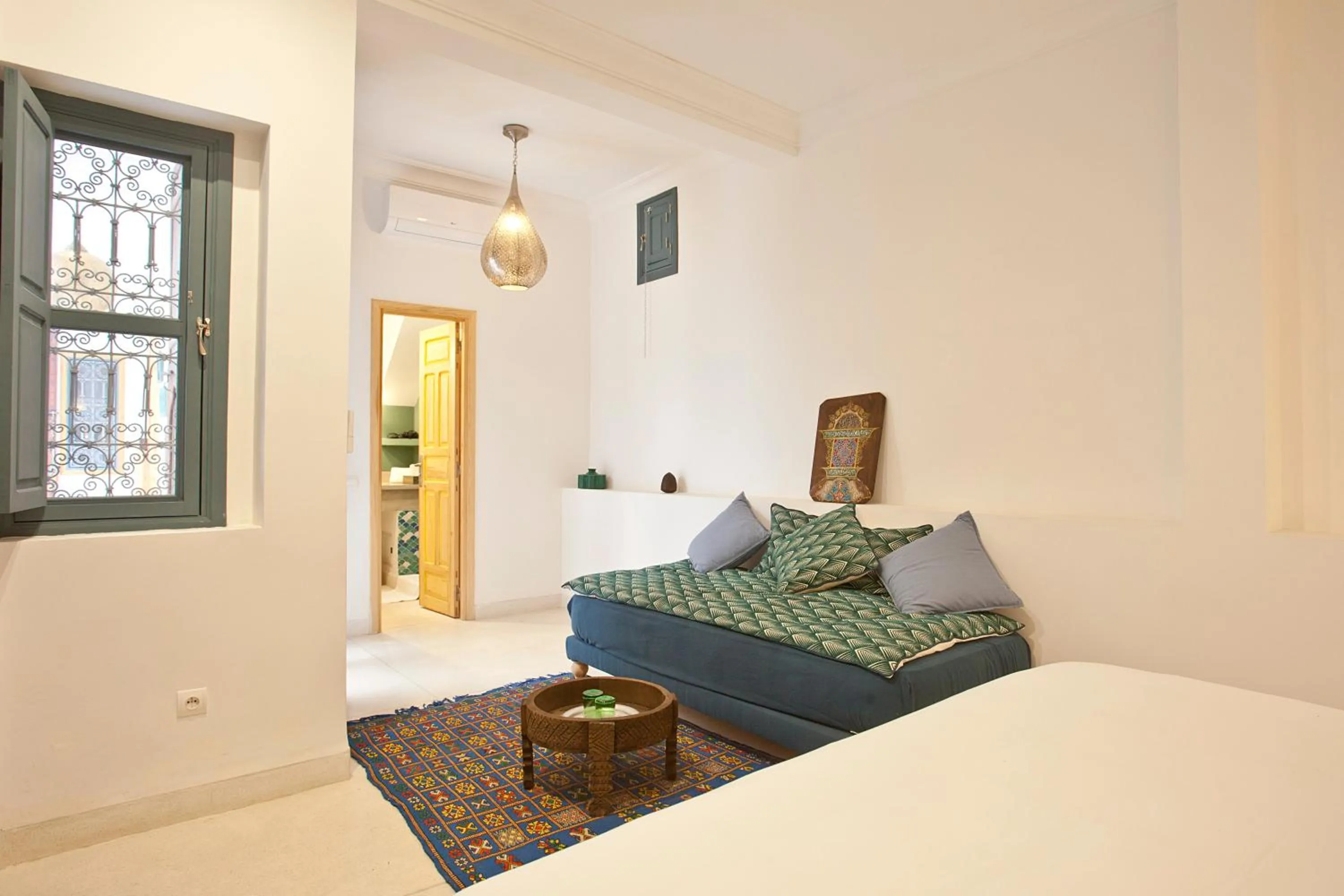 Living room, Bed in Riad AL RIAD