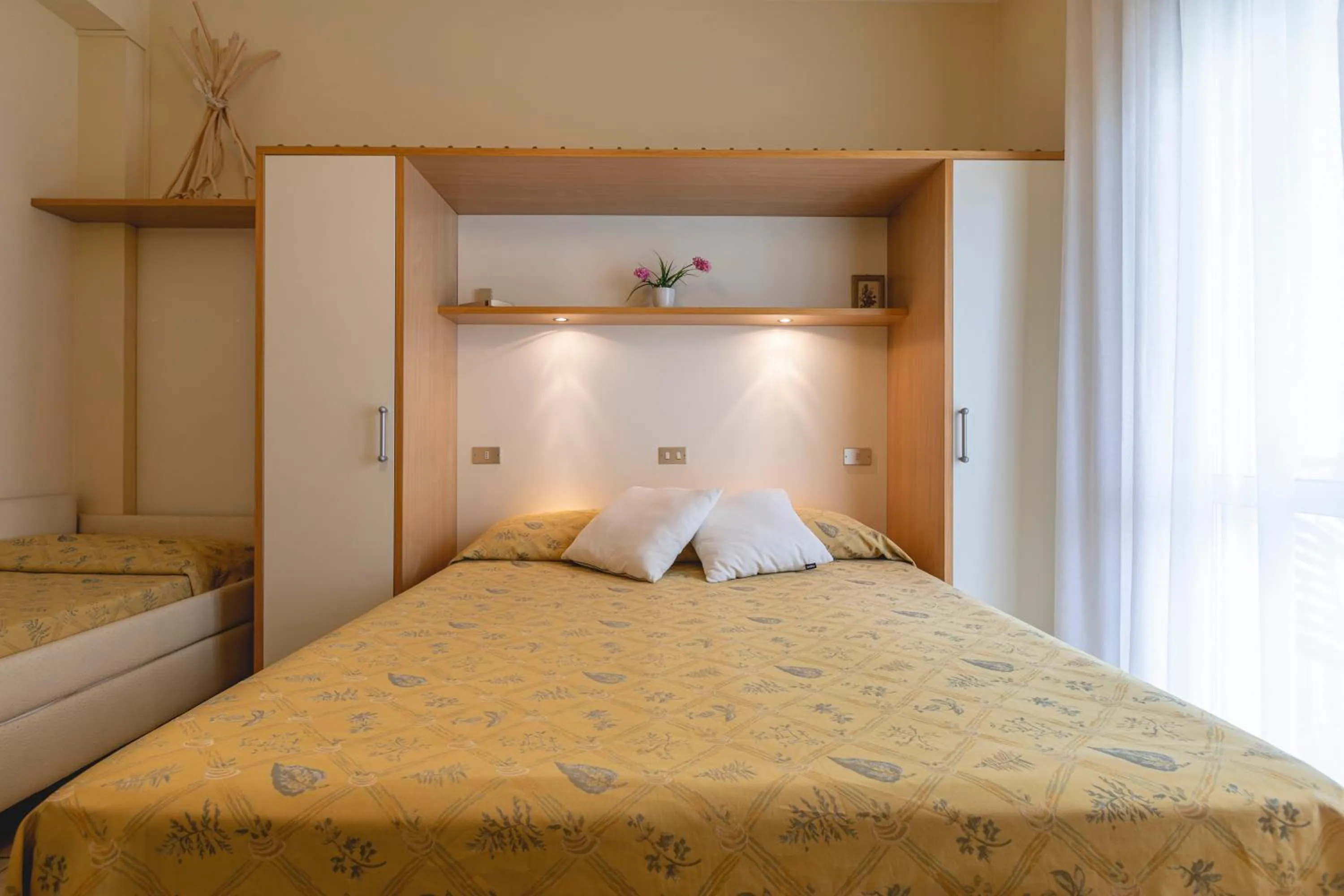 Bed in Hotel Loretta & Dependance