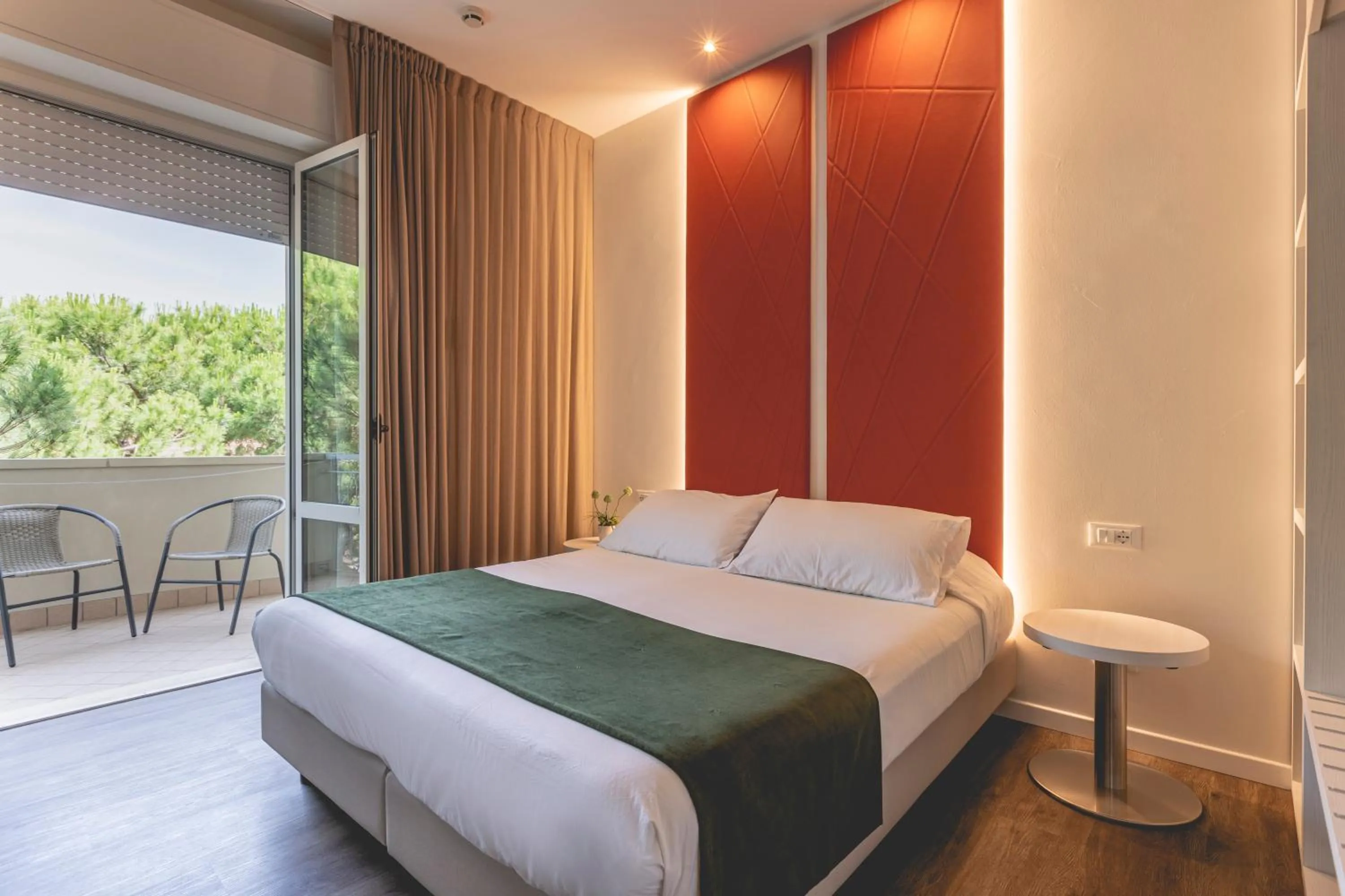 Bed in Hotel Loretta & Dependance