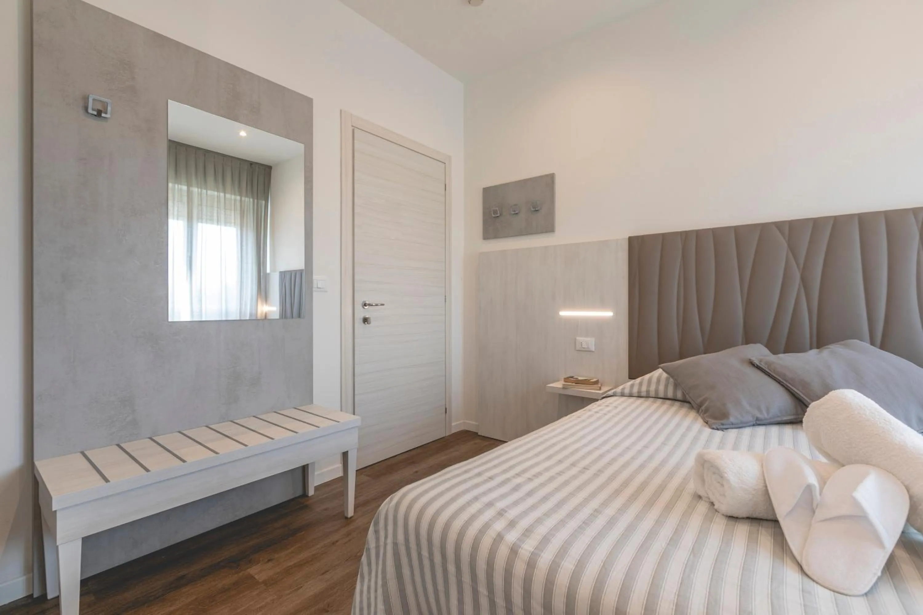 Bed in Hotel Loretta & Dependance