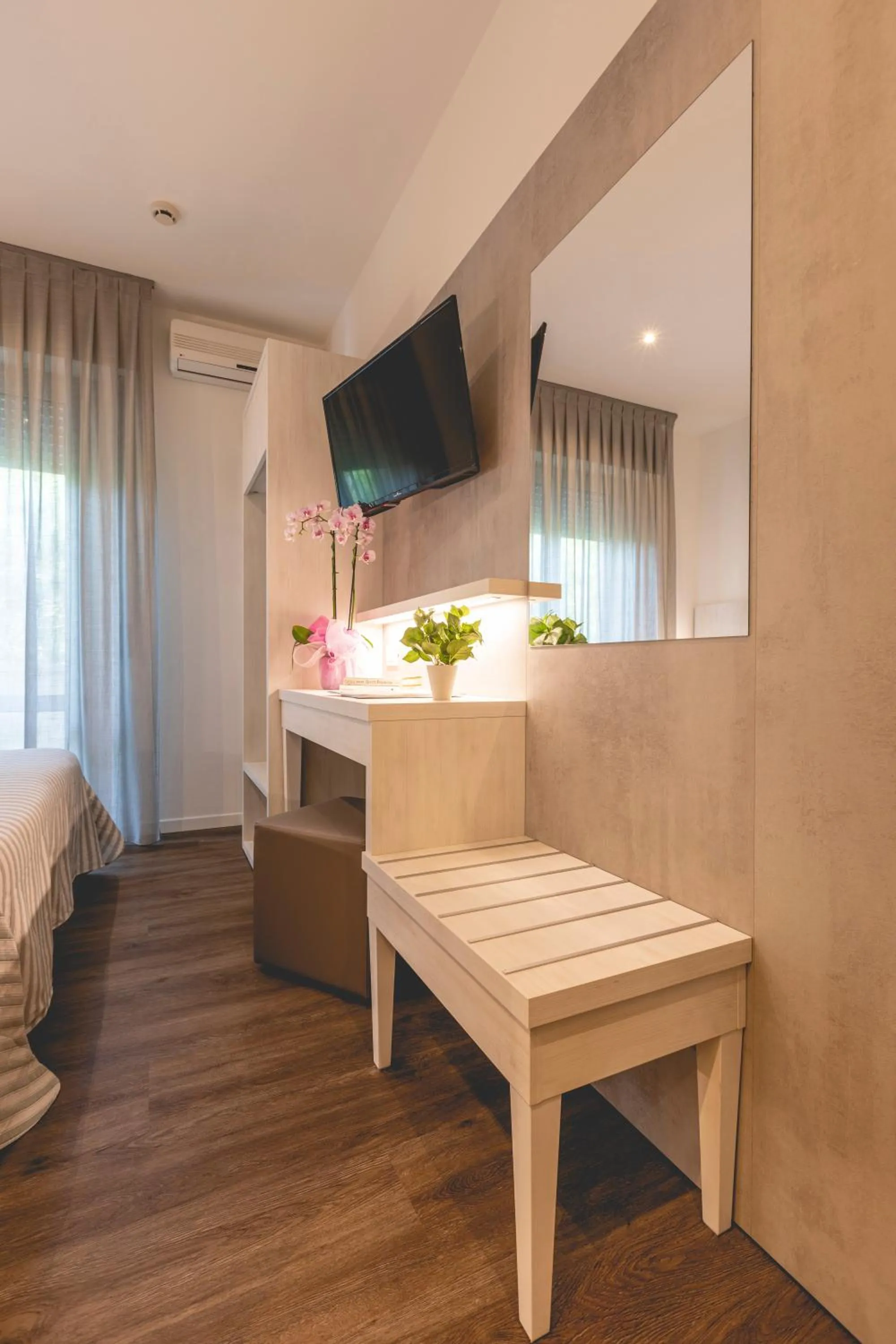 Bed in Hotel Loretta & Dependance