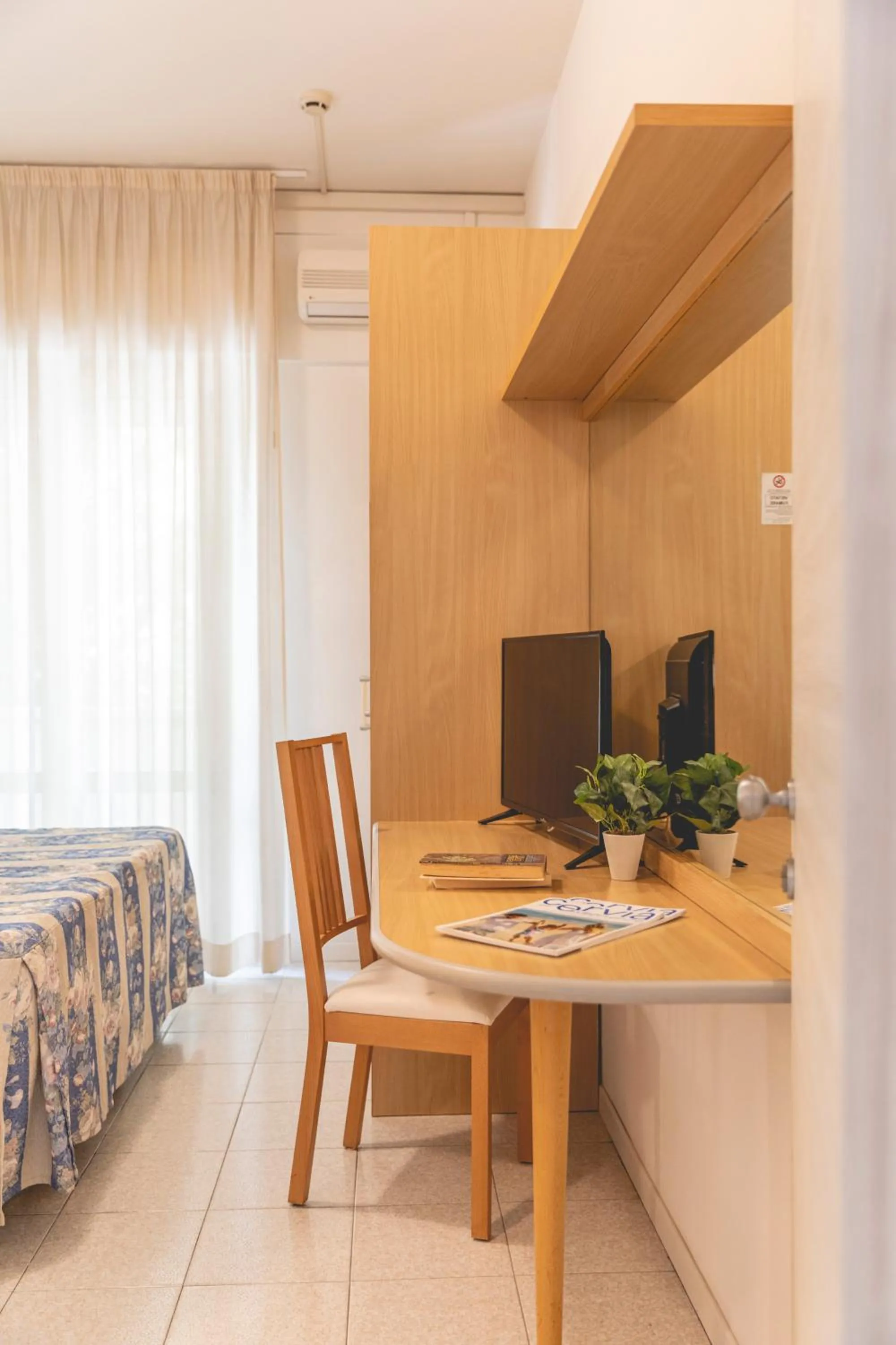 Bed in Hotel Loretta & Dependance