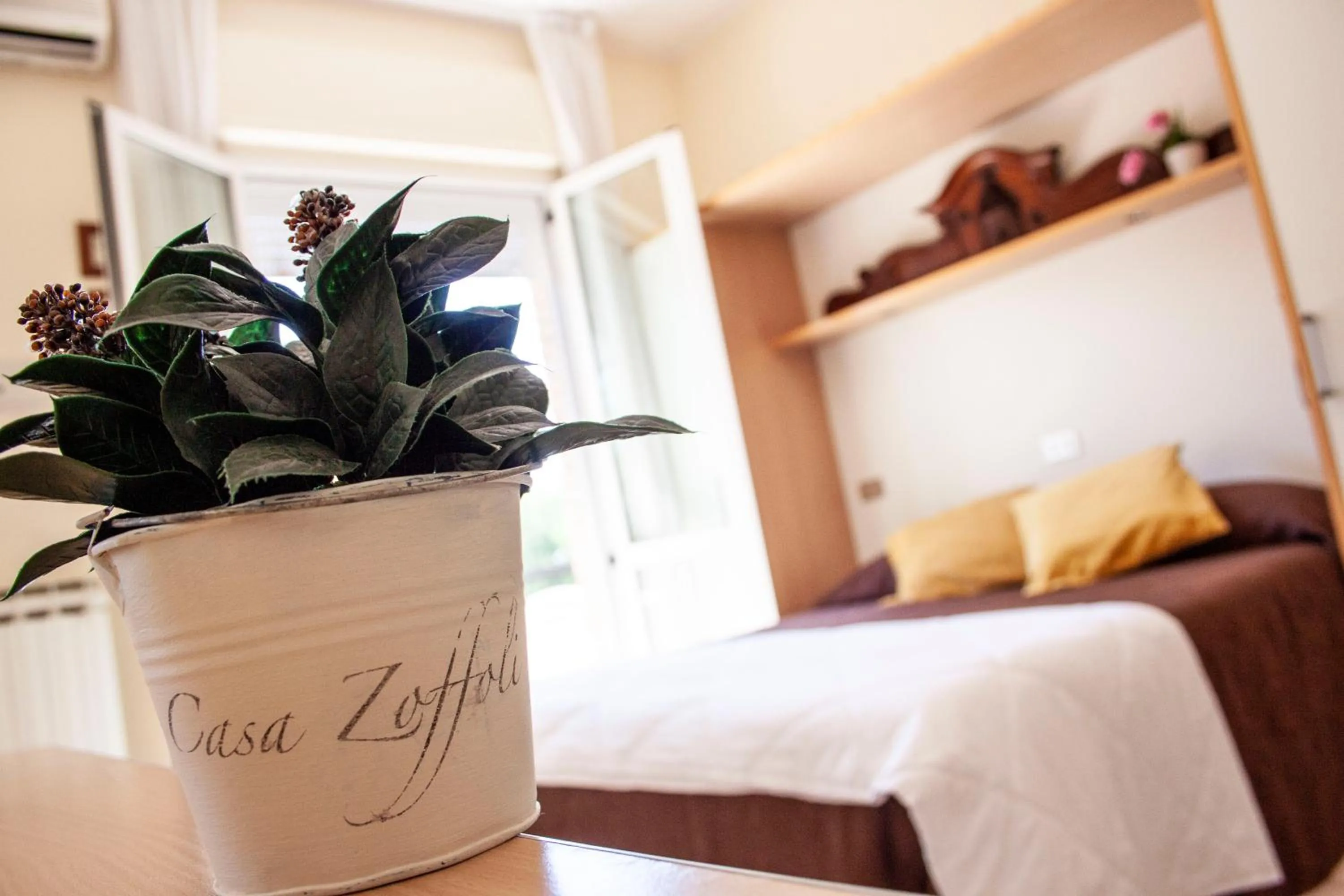 Bed in Hotel Loretta & Dependance