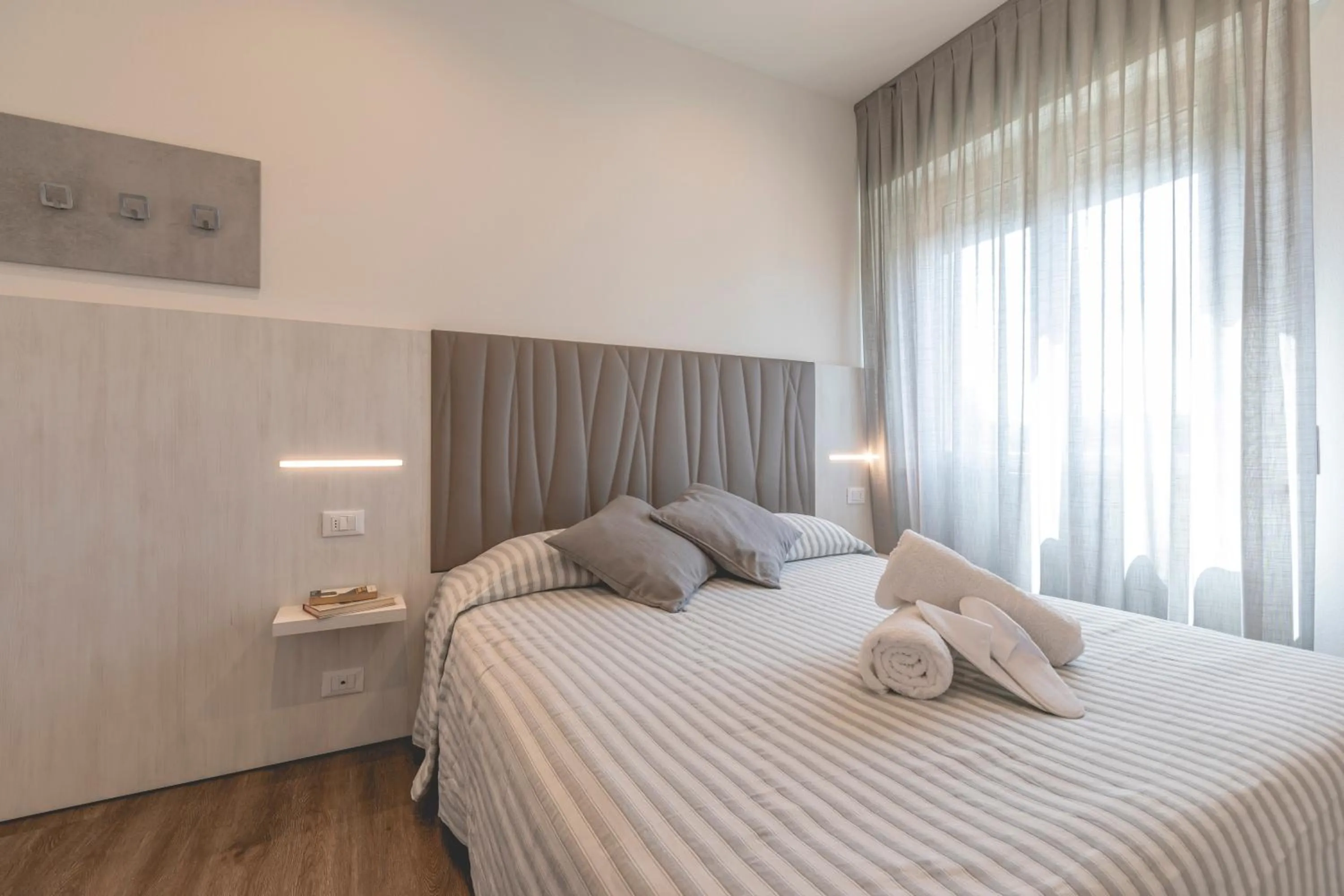 Bed in Hotel Loretta & Dependance