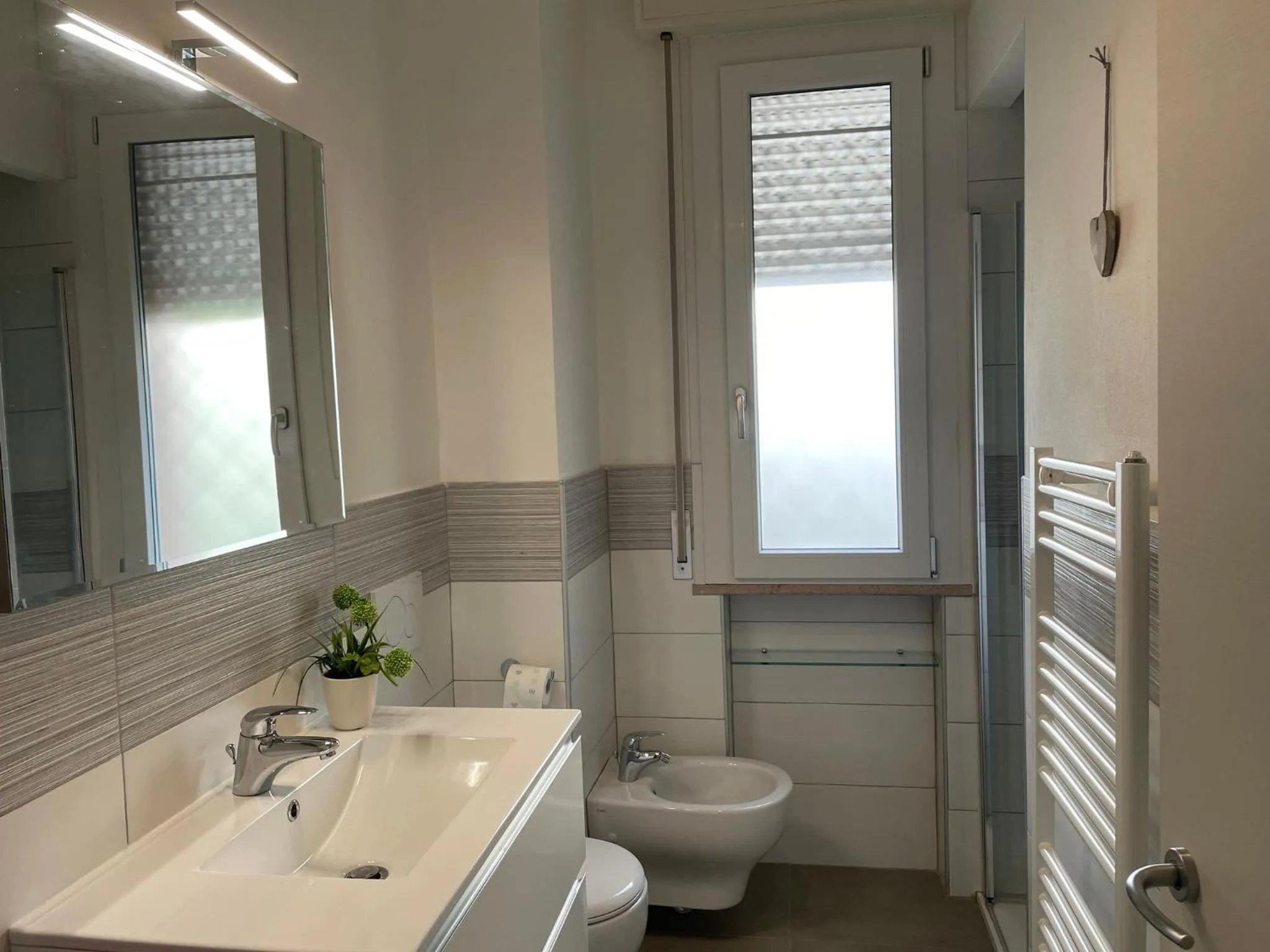 Bathroom in Hotel Loretta & Dependance