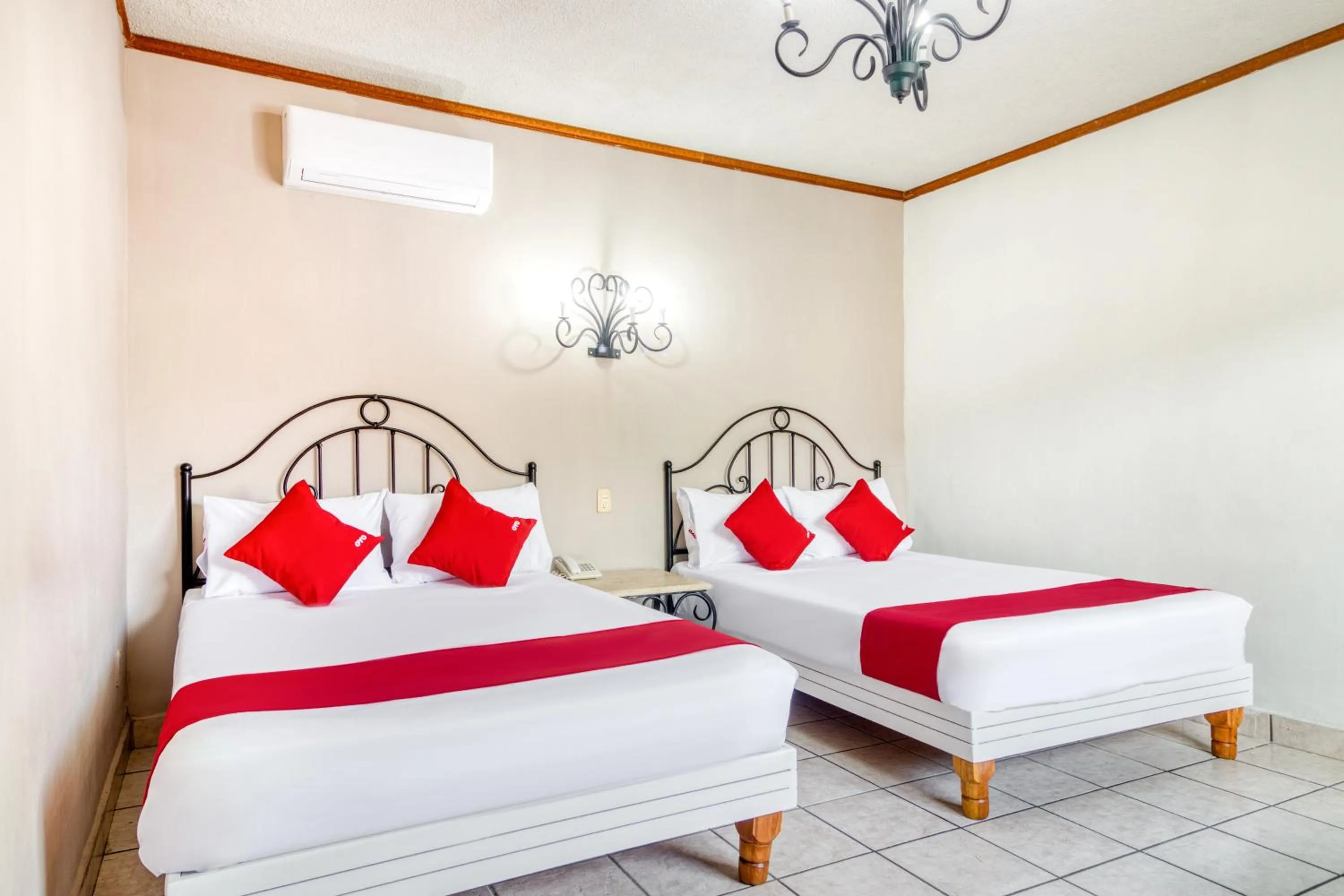 Bedroom in Capital O Hotel La Siesta, Gomez Palacio