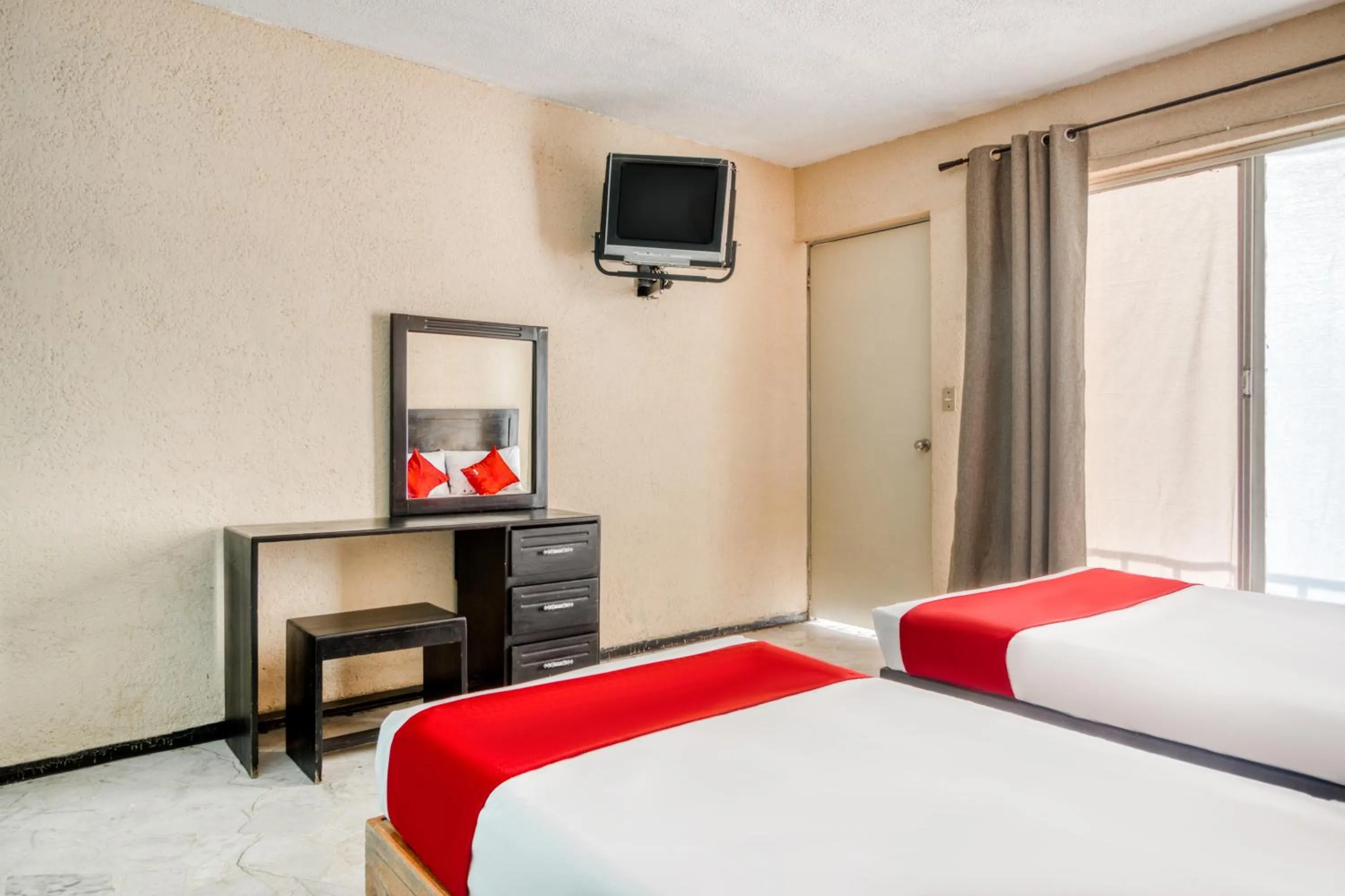 Bedroom in Capital O Hotel La Siesta, Gomez Palacio