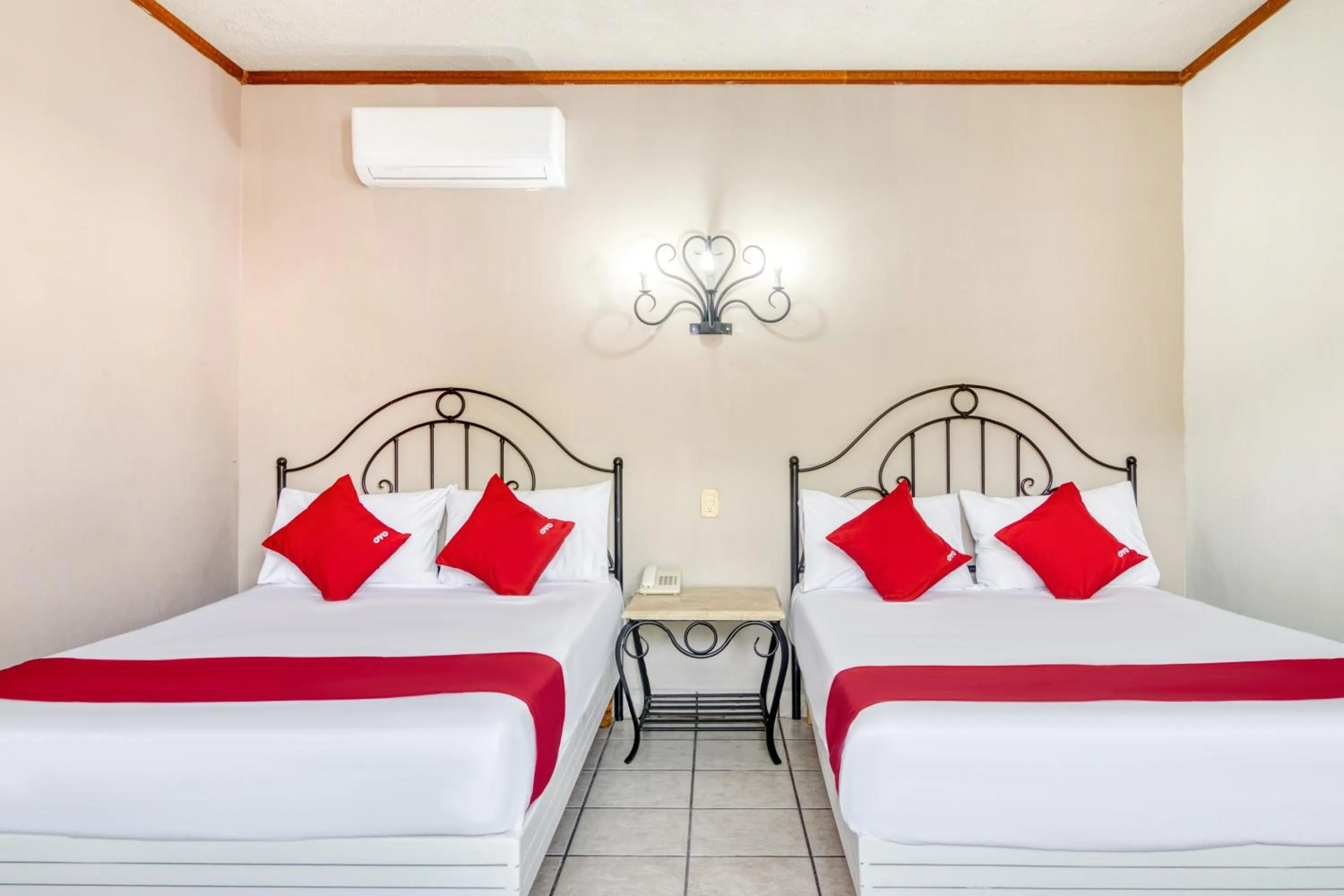 Bedroom in Capital O Hotel La Siesta, Gomez Palacio