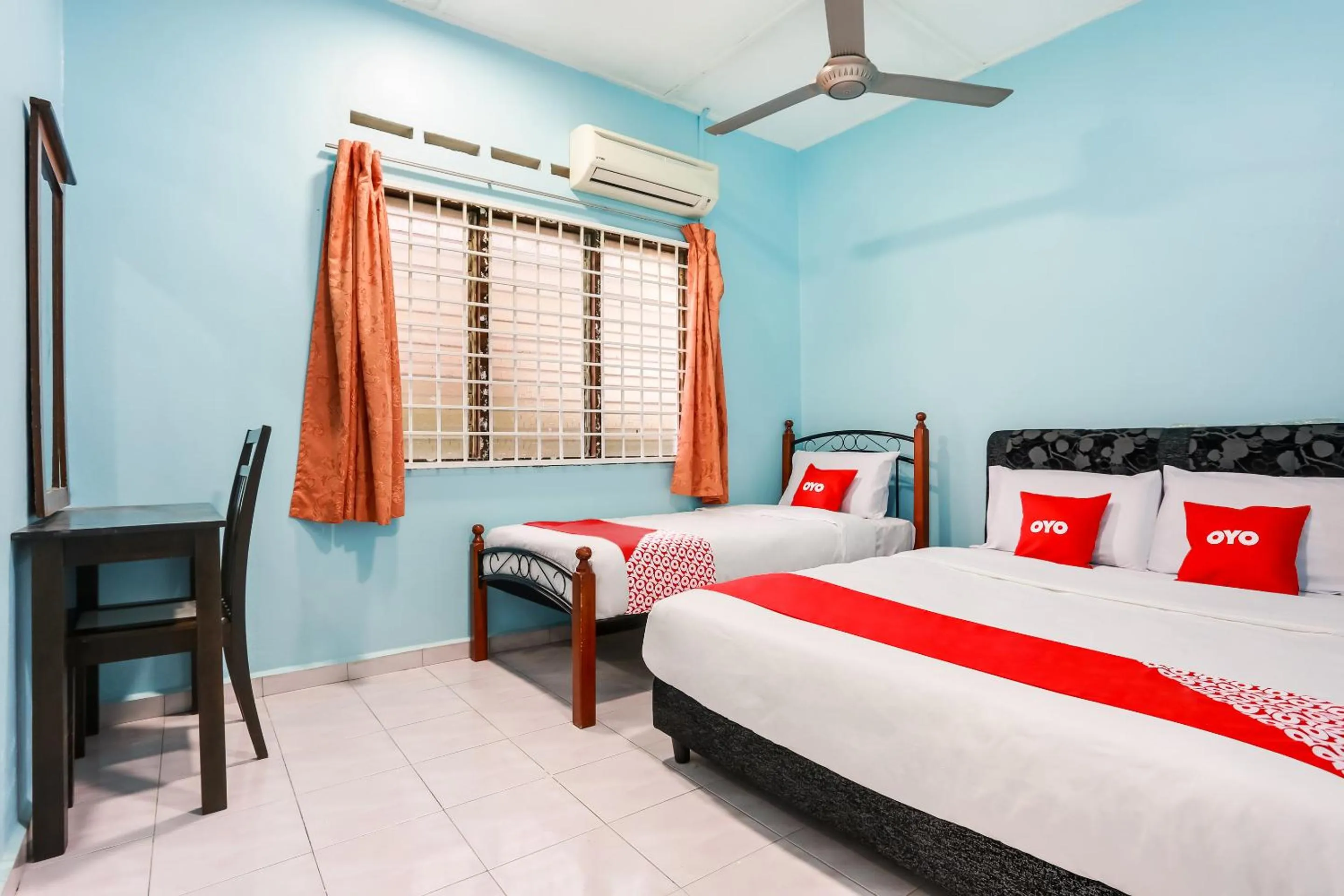Bed in OYO 44094 Bangi Lanai Hotel