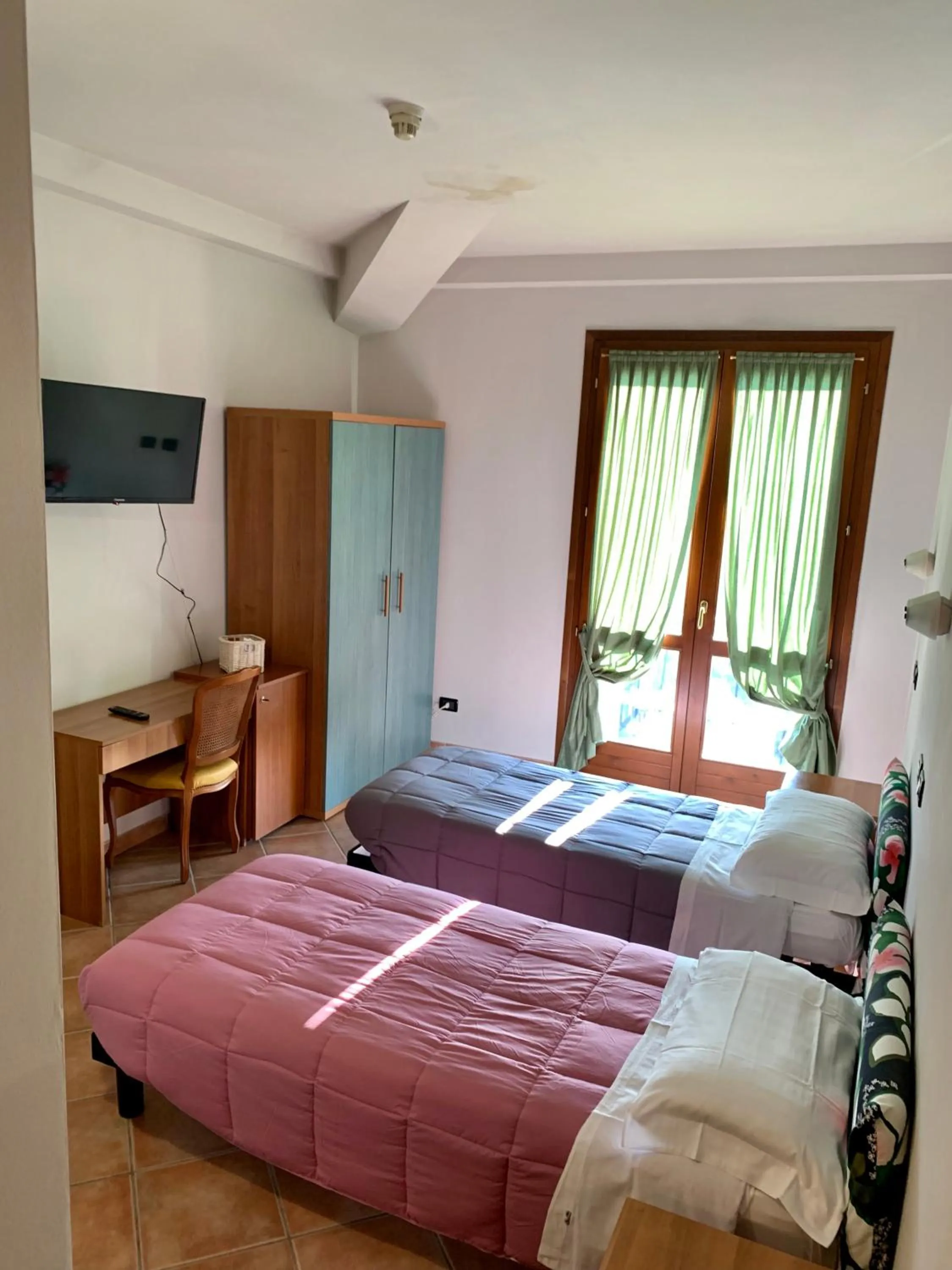 Bed in Hotel Riviera Ristorante La Briciola