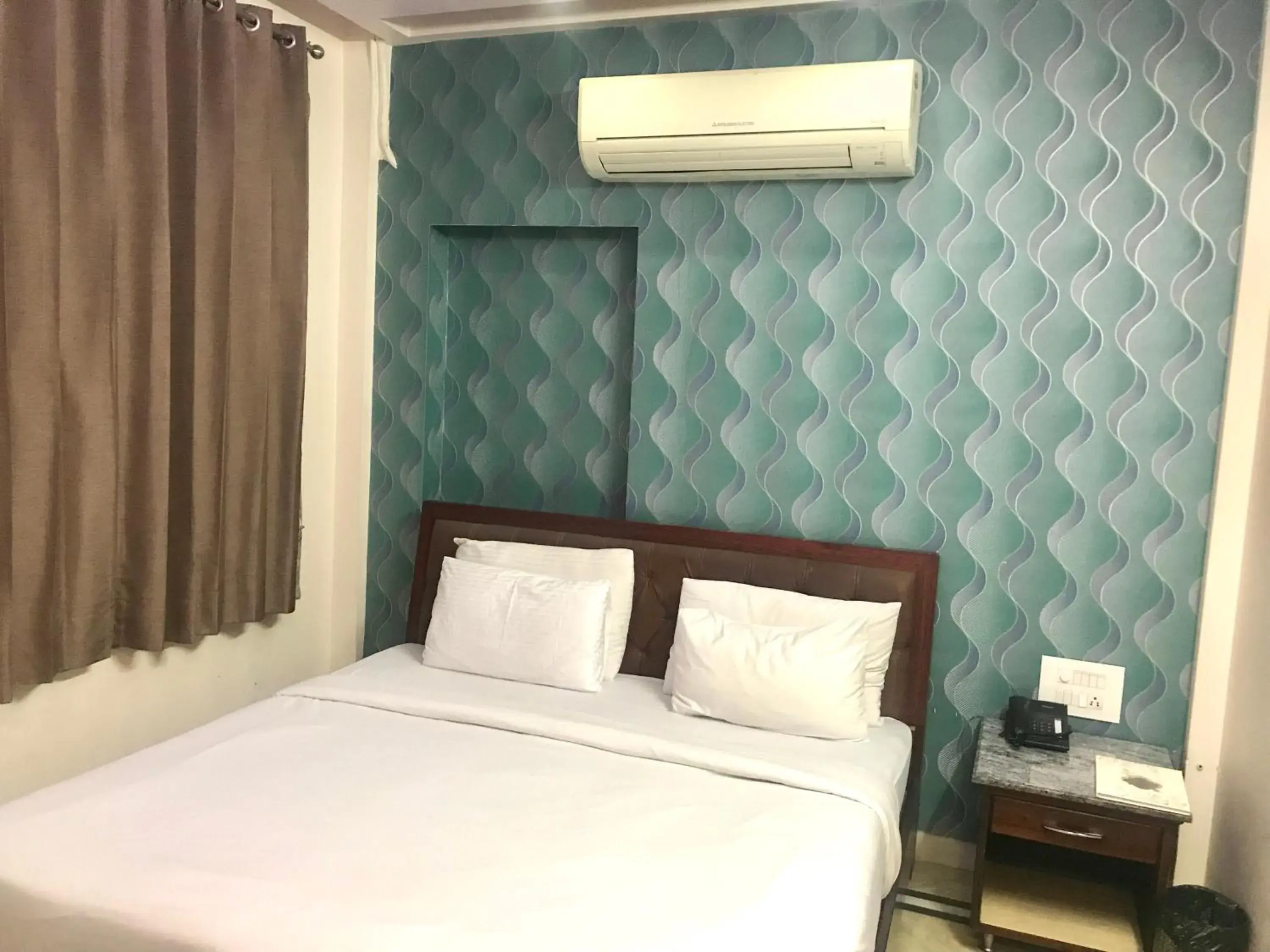 Budget Double Room - single occupancy in Leela Residency Budget Double Room - single occupancy in Leela Residency