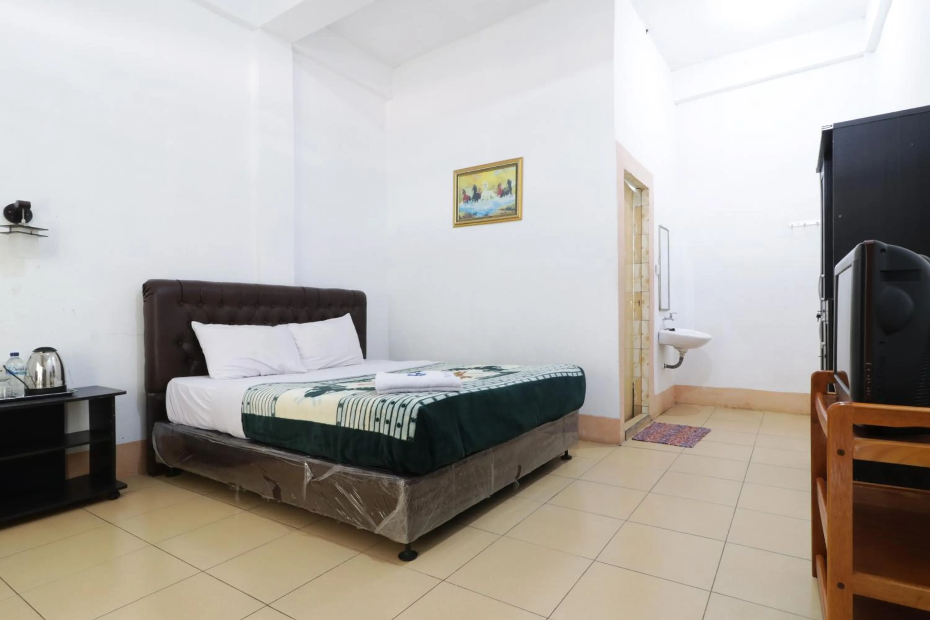 Bed in Villa Keluarga Bre Batunanggar