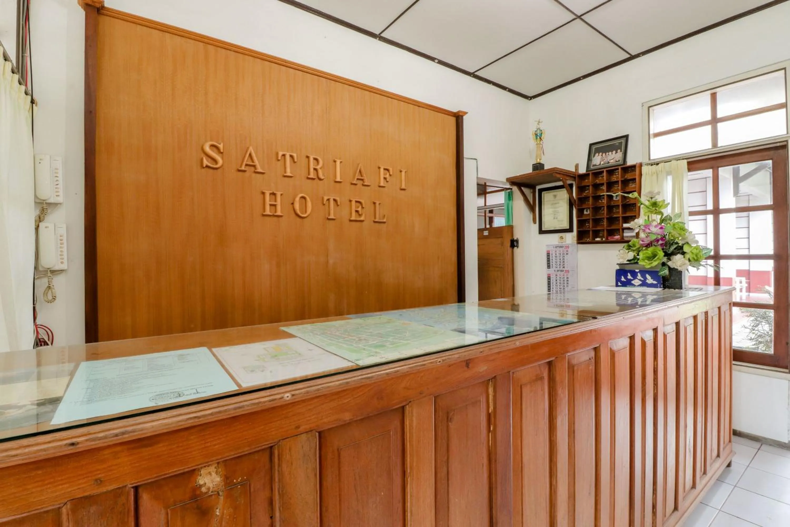 Lobby or reception in Satriafi Hotel