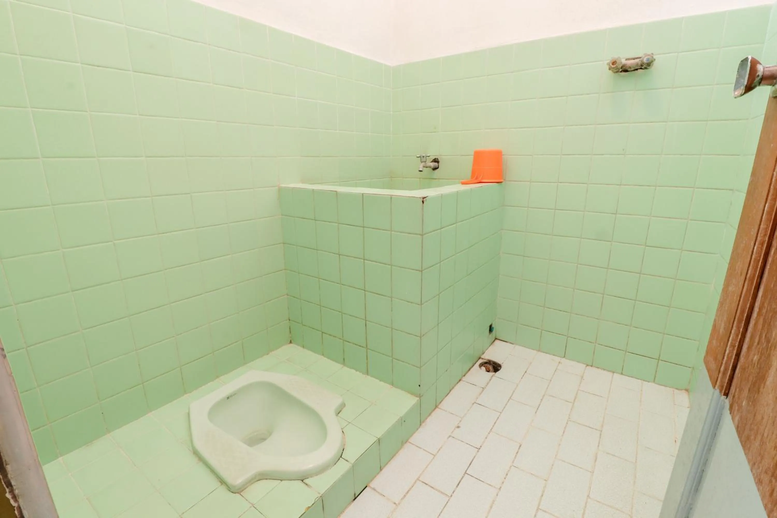 Bathroom in Satriafi Hotel