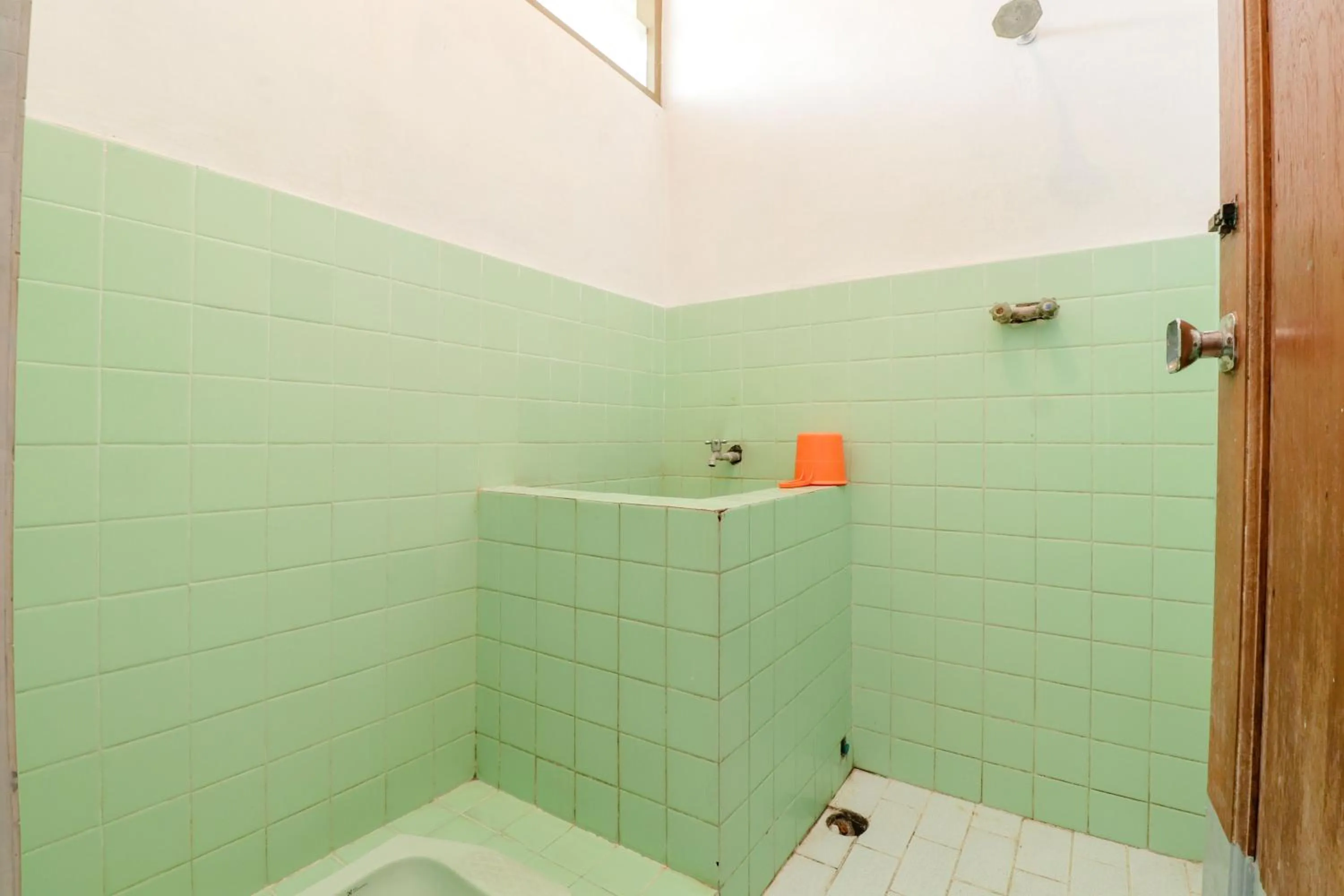 Bathroom in Satriafi Hotel