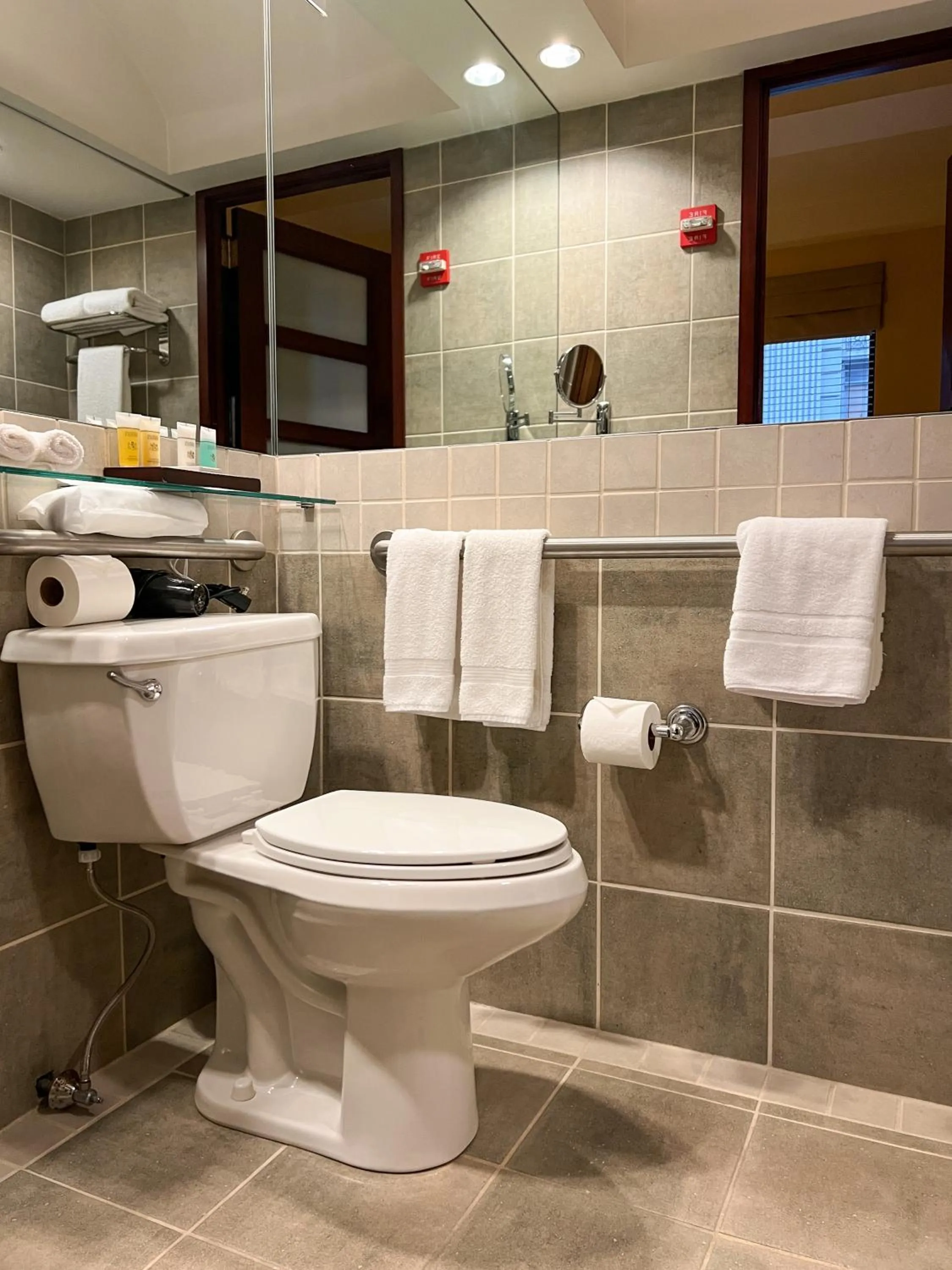 Toilet in Library Hotel by Library Hotel Collection